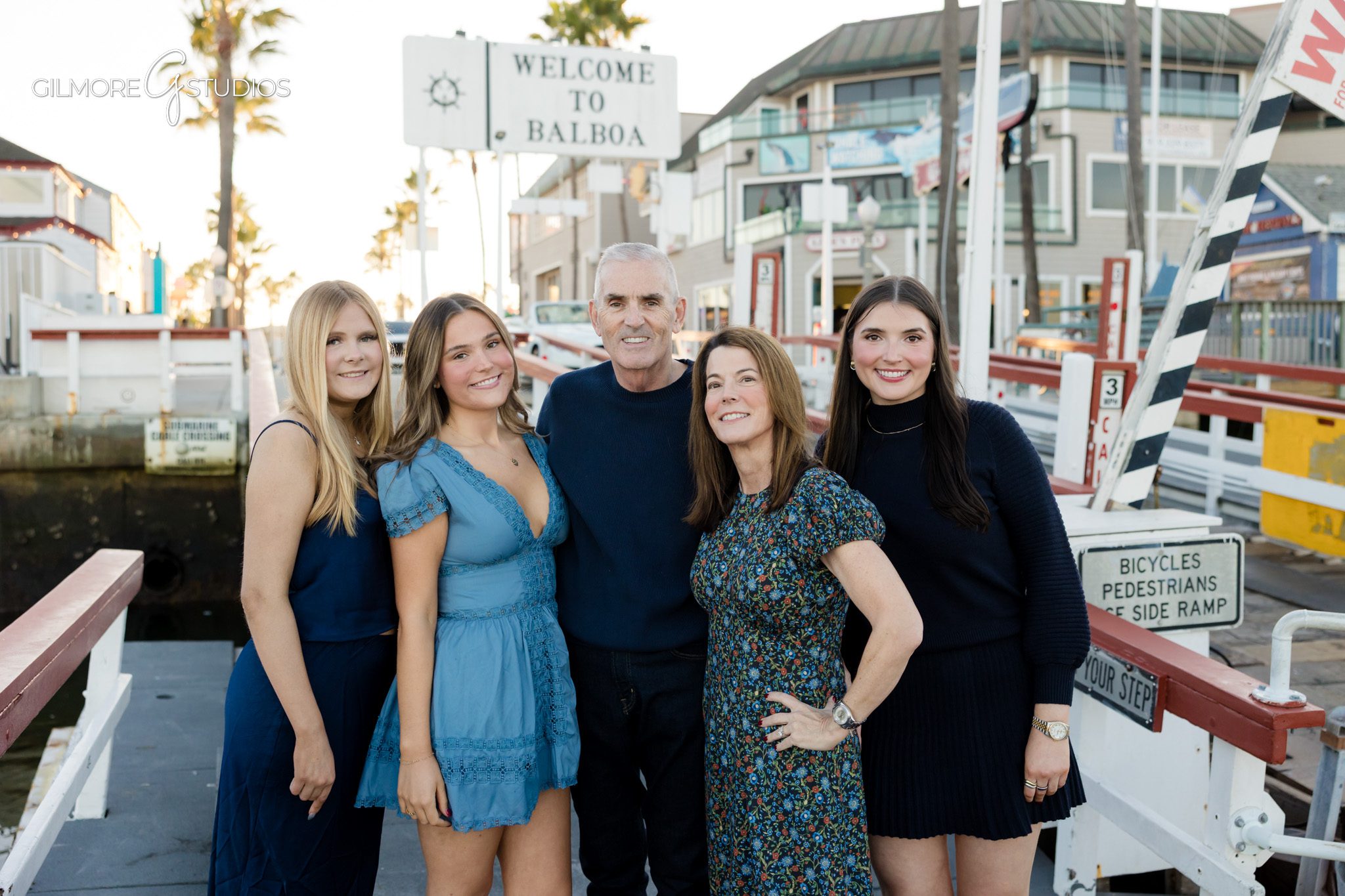 Family photographer creating relaxed Christmas photos at the beach,

Balboa Island holiday photo session with professional photographer