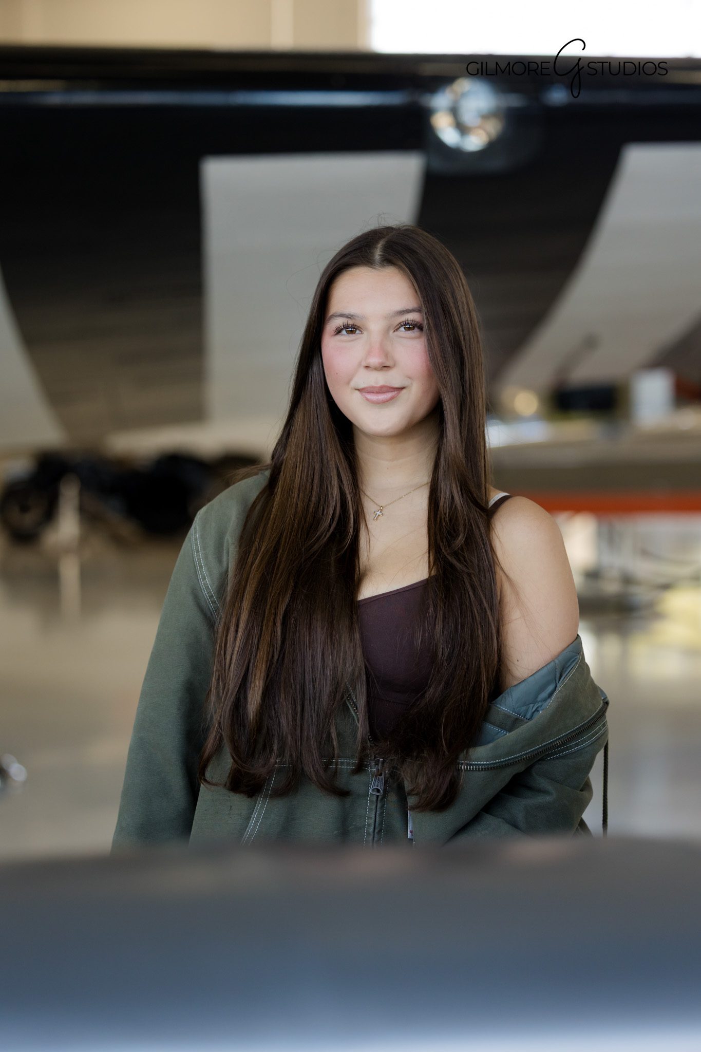 Editorial senior girl portrait by Gilmore Studios Orange County
Senior girl posing in bright museum light Costa Mesa photographer