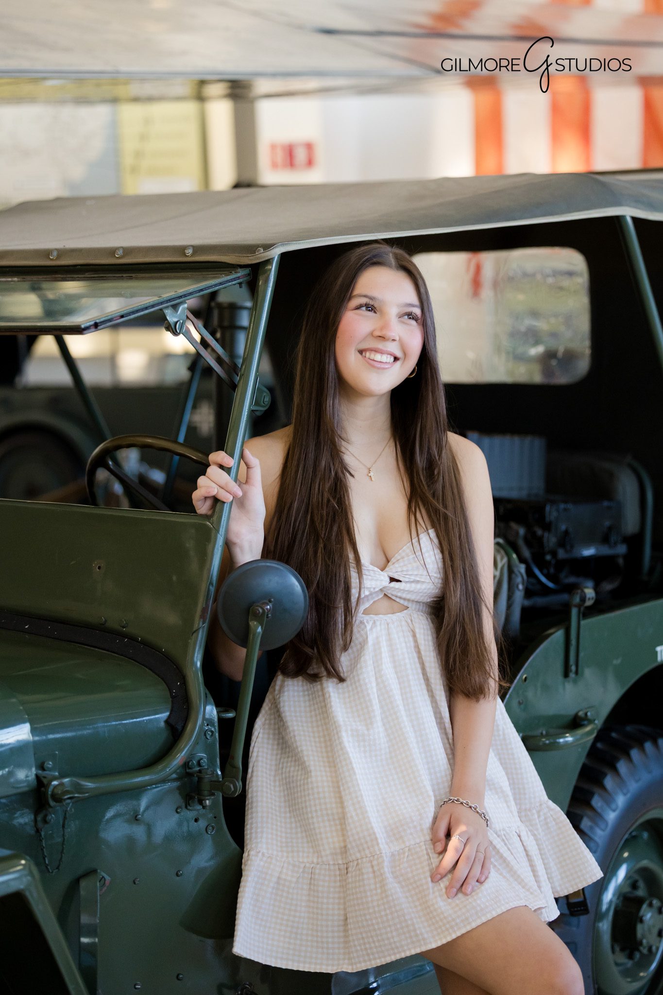 Confident senior portrait captured indoors by OC photographer
Graduation photo session inside Lyons Museum Costa Mesa
