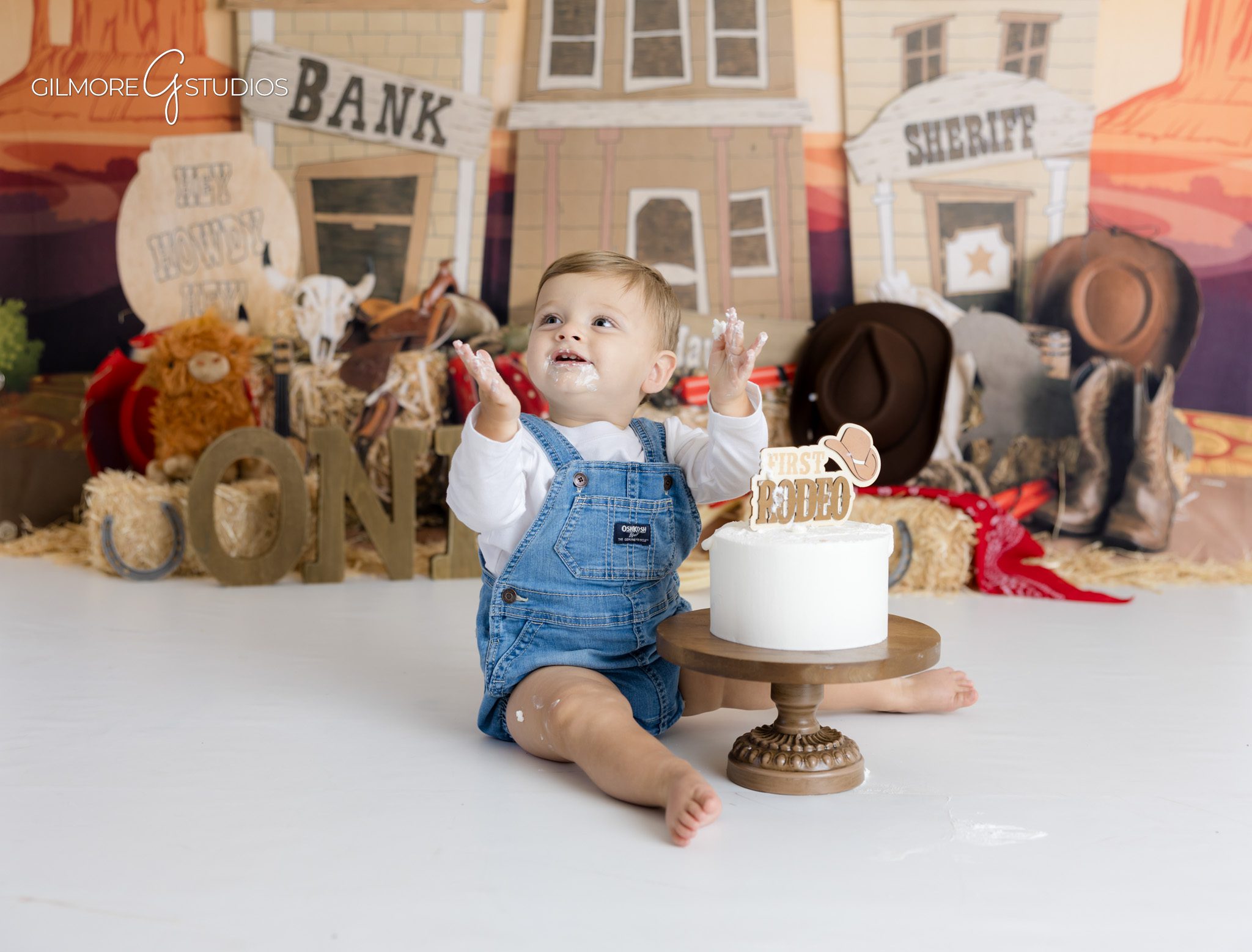 First rodeo birthday session photographed by Scottsdale portrait photographer,

Western style baby photography with cowboy hat and stars backdrop