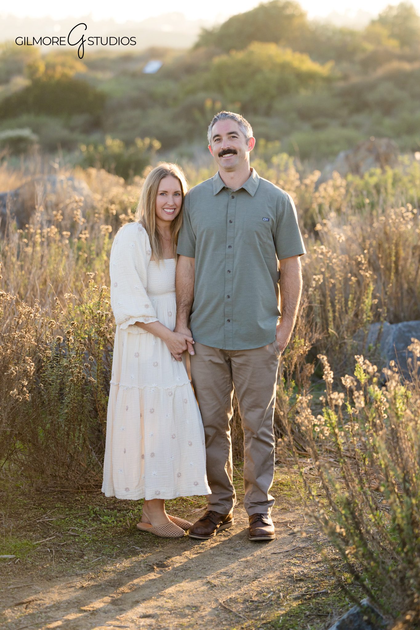 gilmore studios fall family photo day,

mom holding baby fall photos oc nature