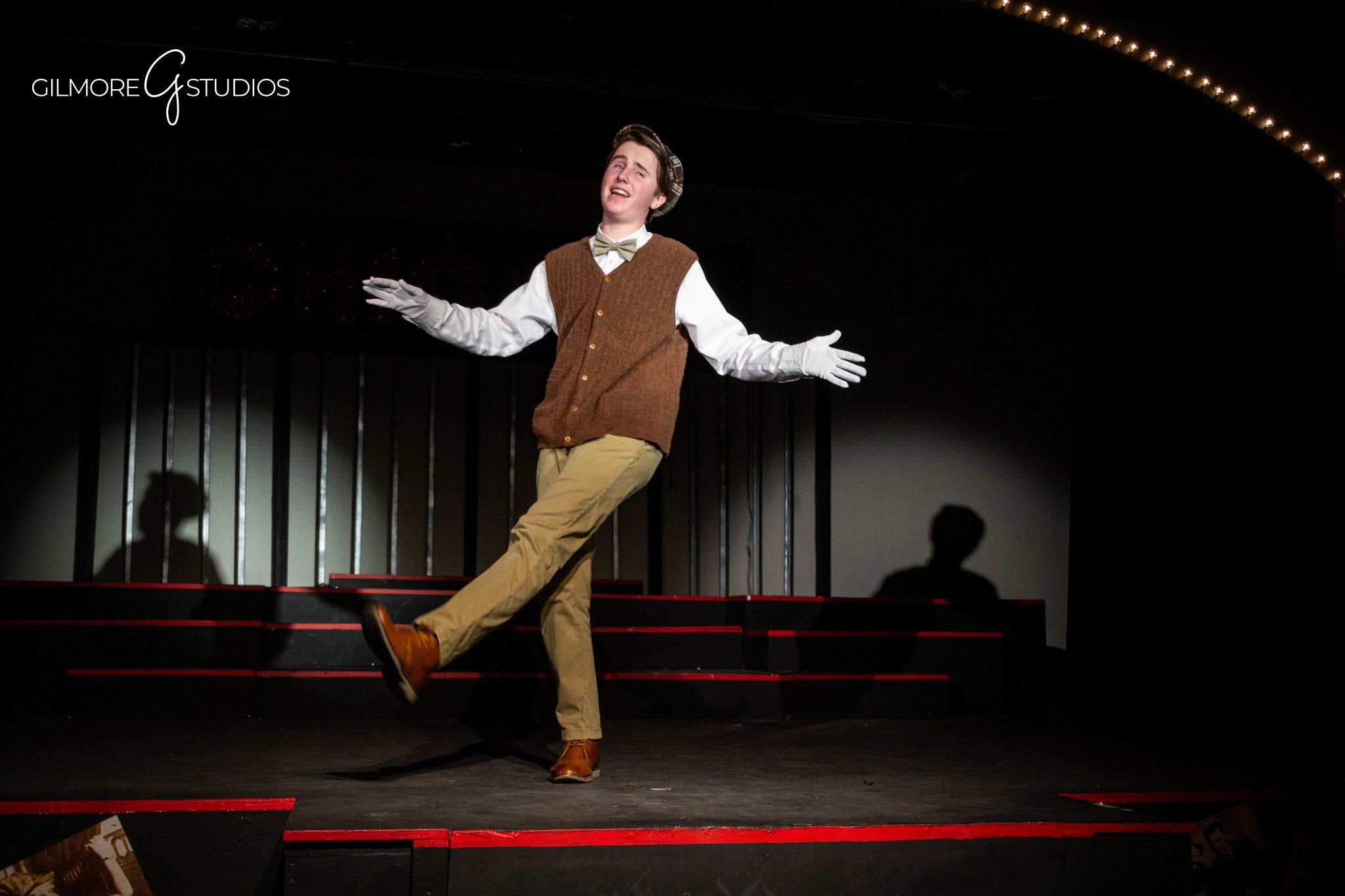 Performance photographer capturing dynamic ensemble scenes for theater marketing.
Professional theater photography of emotional cast bowing to audience applause.