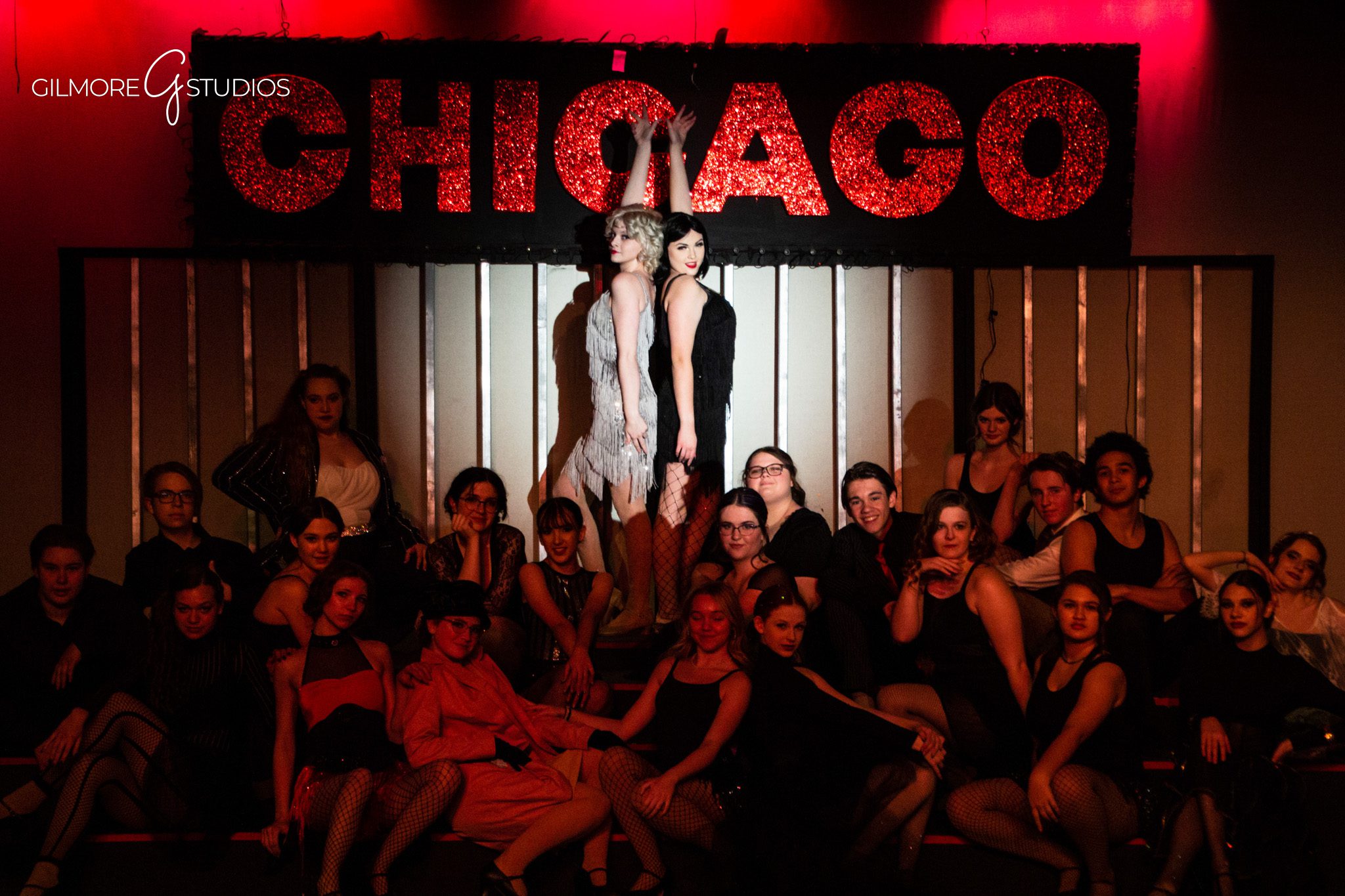 Commercial portrait photographer capturing actor headshots for promotional materials.
Professional production photography highlighting set design and stage lighting artistry.