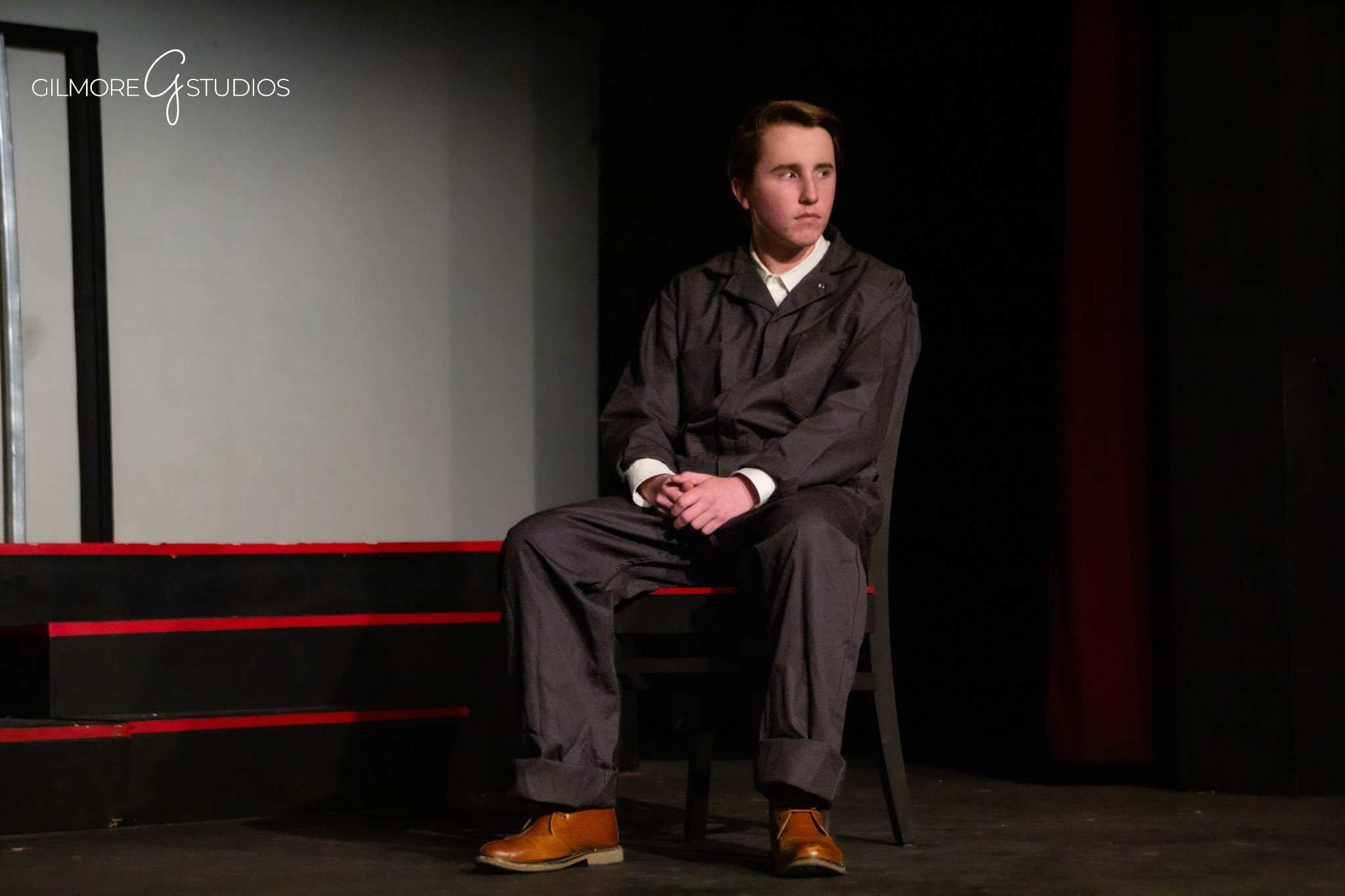 Live performance photography of dance choreography under spotlight.
Commercial photographer documenting director and creative team during production.