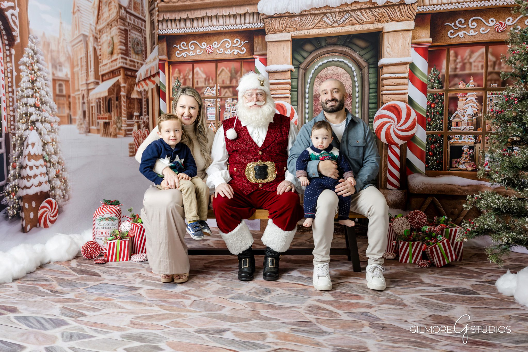 Santa Mini Session photography with beautifully styled Christmas set.

Orange County holiday photographer capturing classic Christmas portrait.