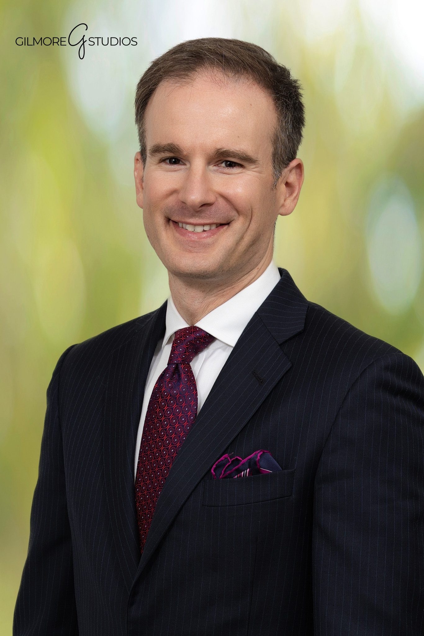 San Diego photographer capturing on-stage leadership presentation.
Corporate photography showing business partners discussing strategy.