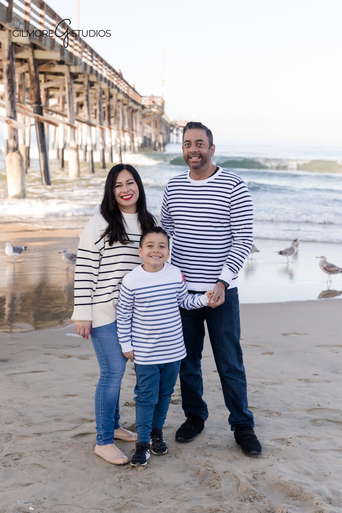 Boy birthday portrait photography with ocean backdrop at Newport Pier

Newport Pier beach birthday photography featuring a playful young boy