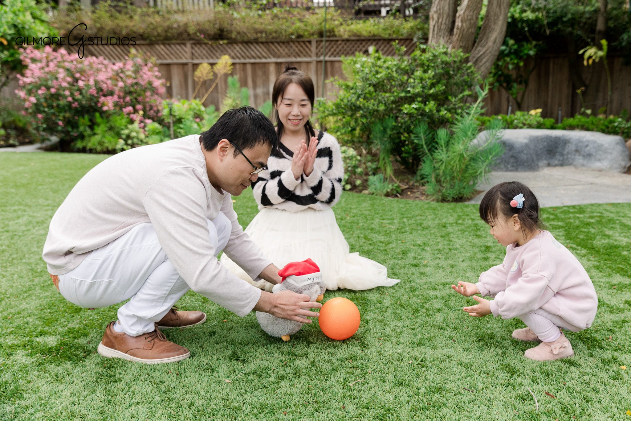 Birthday photography for a 2 year old enjoying ice cream photographed naturally
Child photographer capturing candid toddler birthday moments at an ice cream shop