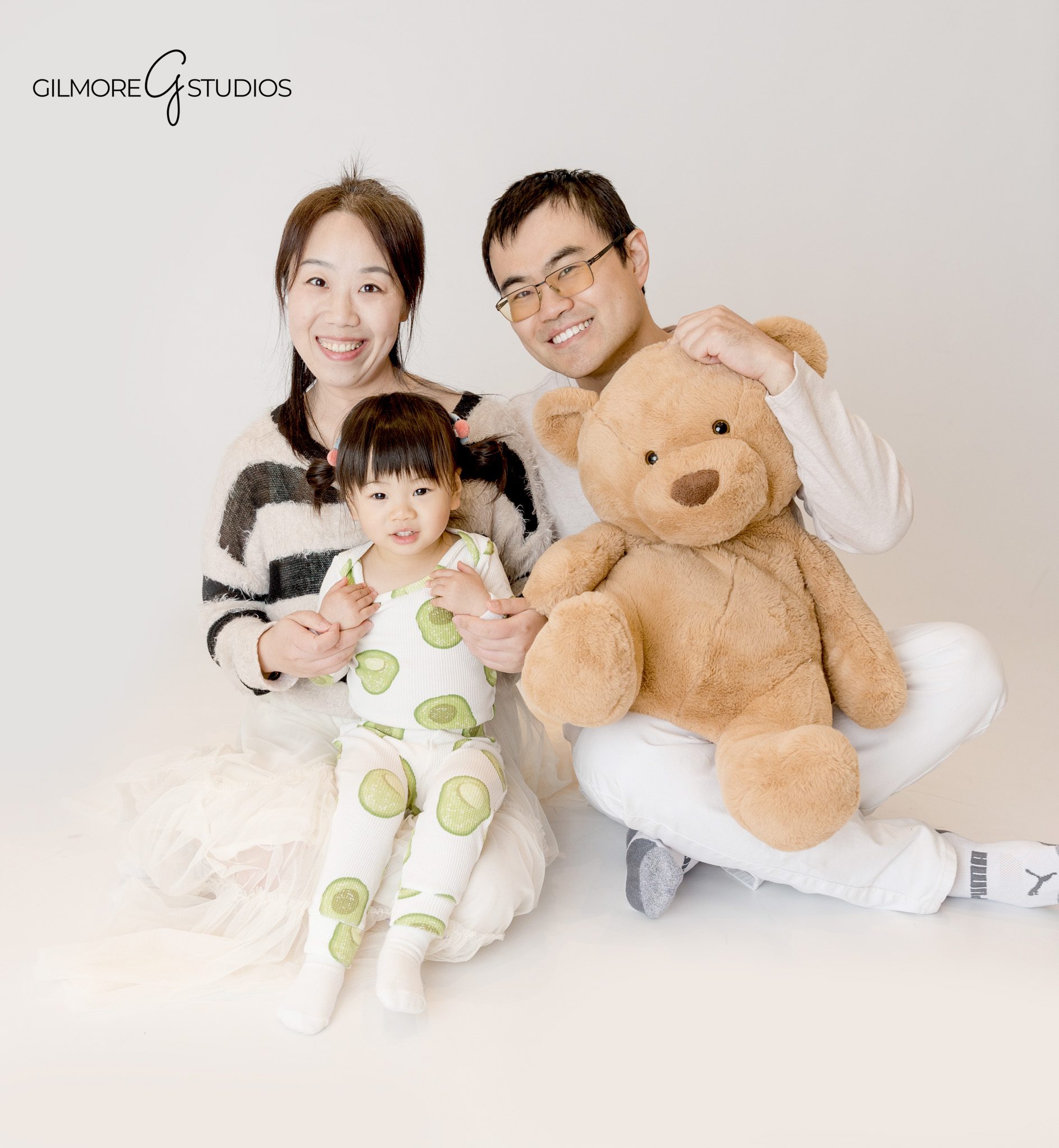 Child photographer photographing a 2 year old birthday session with ice cream
Ice cream shop birthday photography capturing toddler curiosity and joy