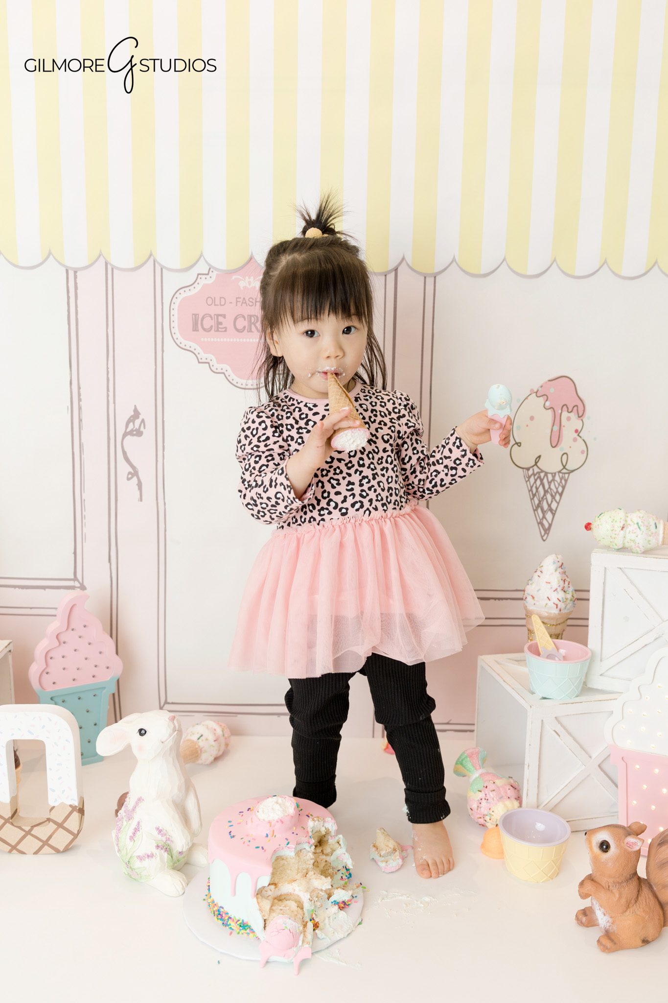 Toddler birthday portrait photography capturing a joyful 2 year old
Ice cream shop toddler photography session documenting a second birthday