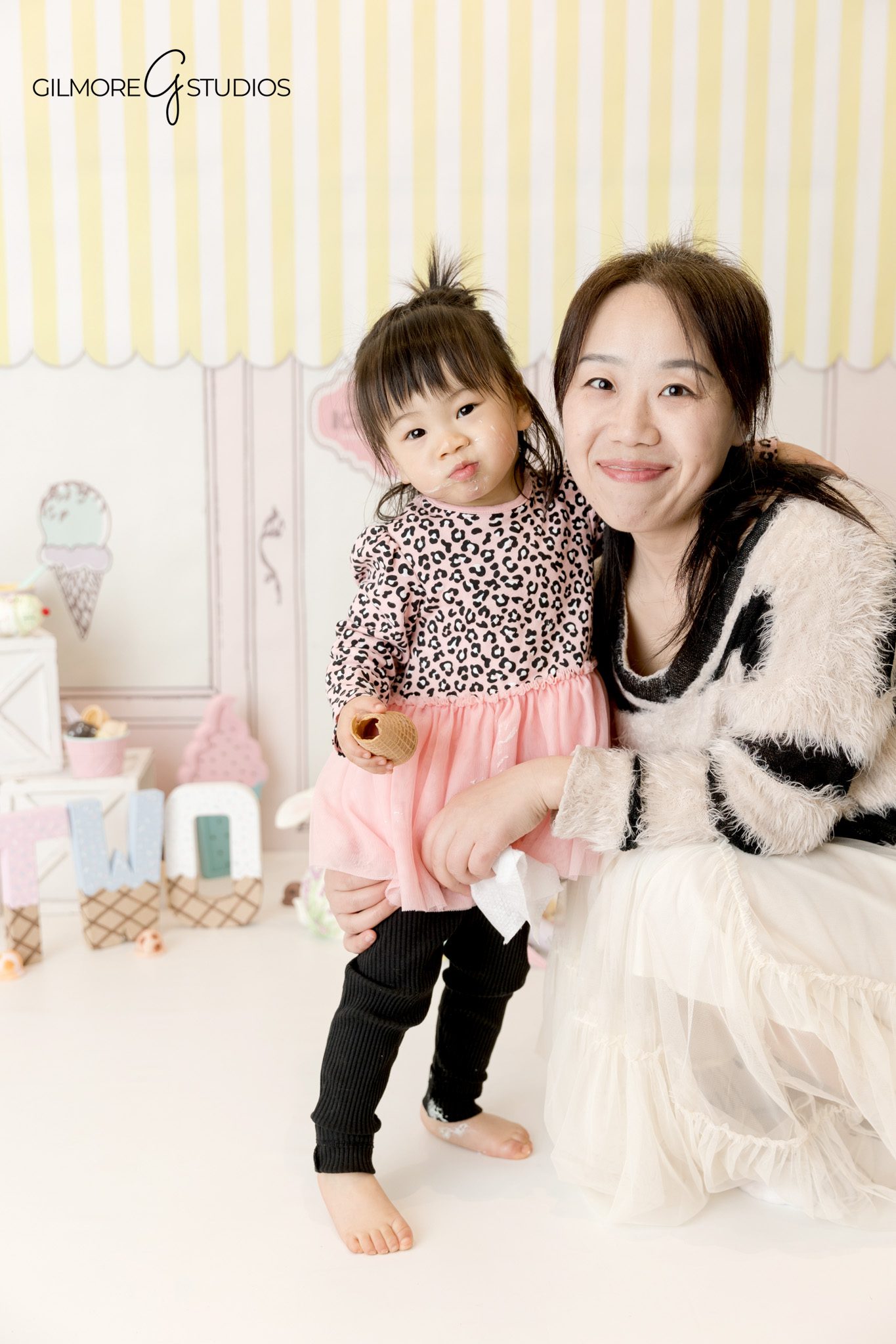 Toddler birthday portrait photography with natural movement and smiles
Child photographer documenting a second birthday milestone session