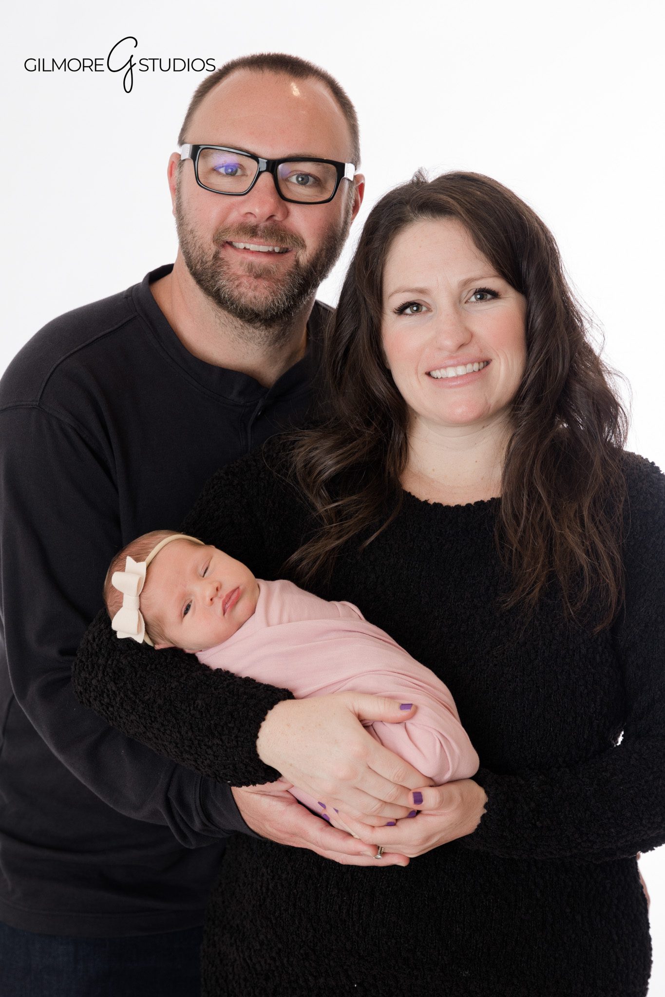 Luxury newborn portrait photographed in a Phoenix Arizona studio

Studio baby photography session captured by a professional photographer