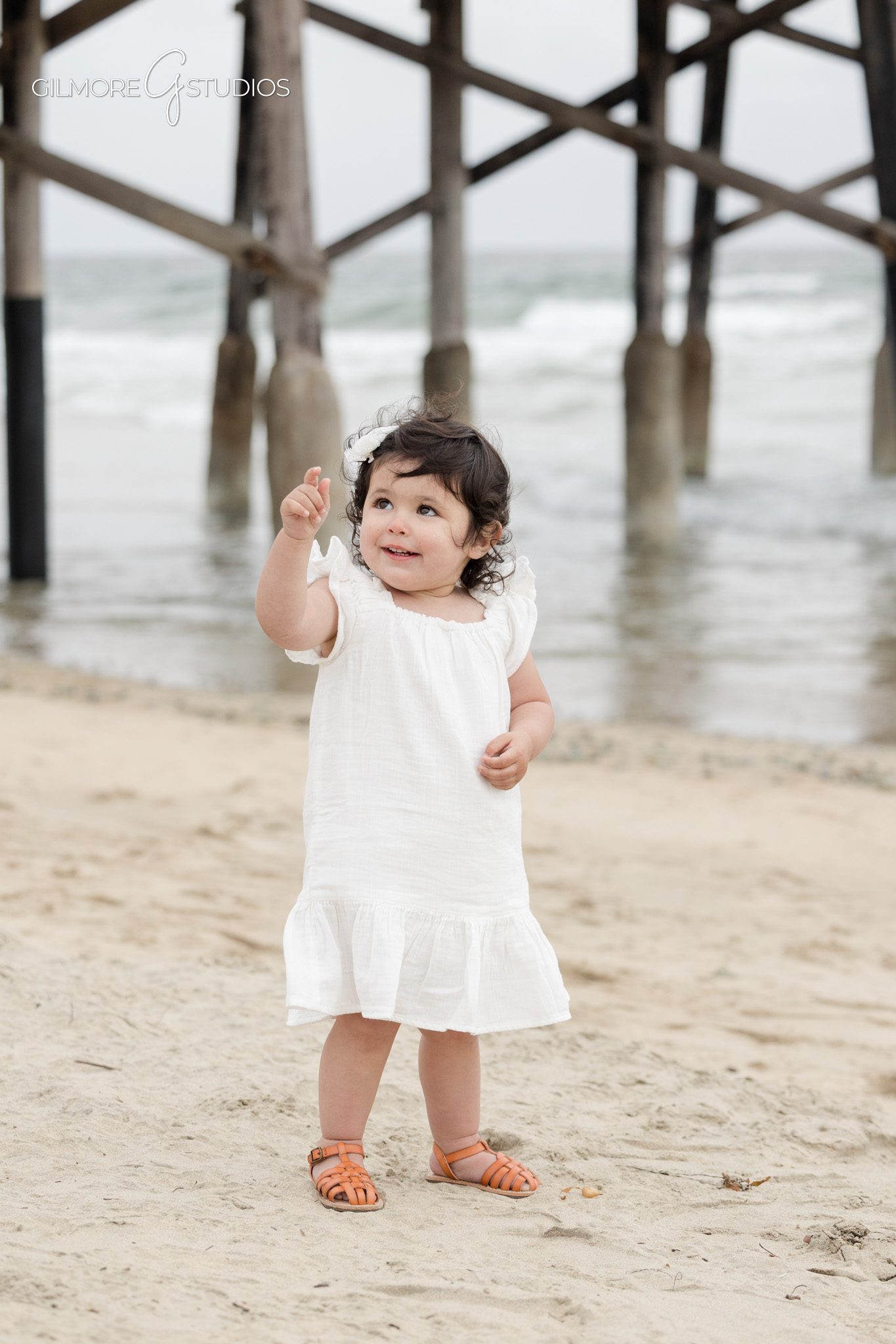 Newport Pier maternity photography with timeless coastal editing
Beach maternity portrait photography captured by a professional photographer
