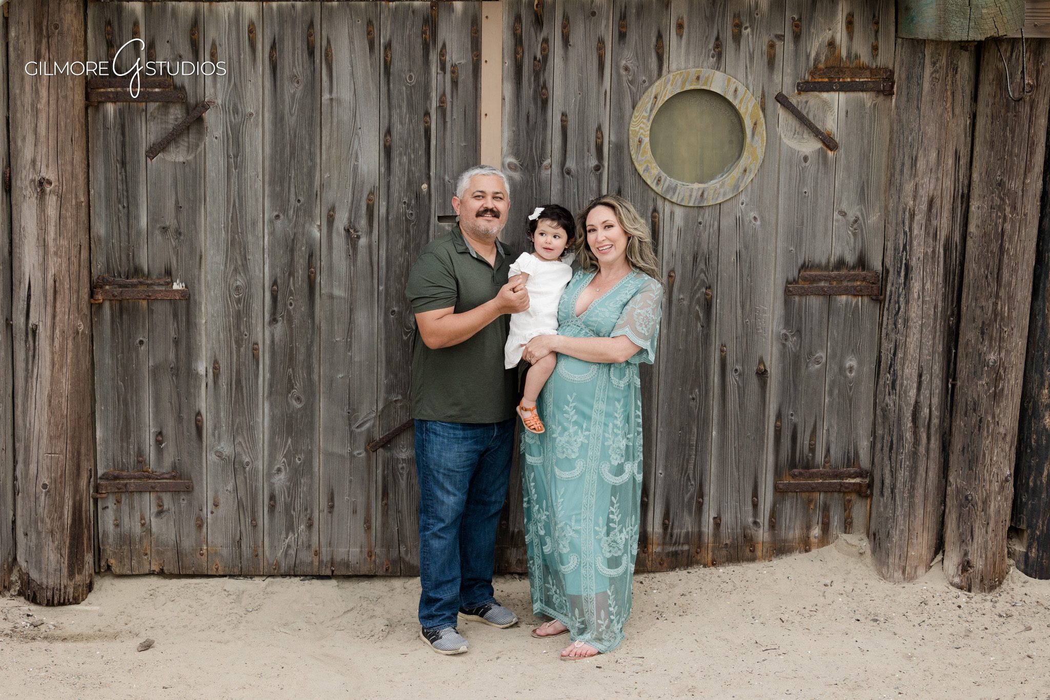 Newport Beach maternity photographer capturing a calm pregnancy session
Coastal maternity portrait photography with neutral styling at Newport Pier