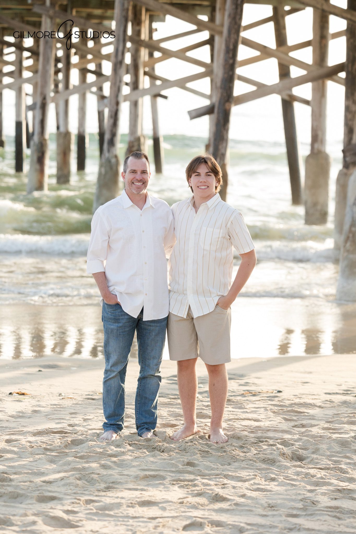Newport Pier family portrait photography featuring children exploring the pier

Coastal family photography captured by a Newport Beach photographer