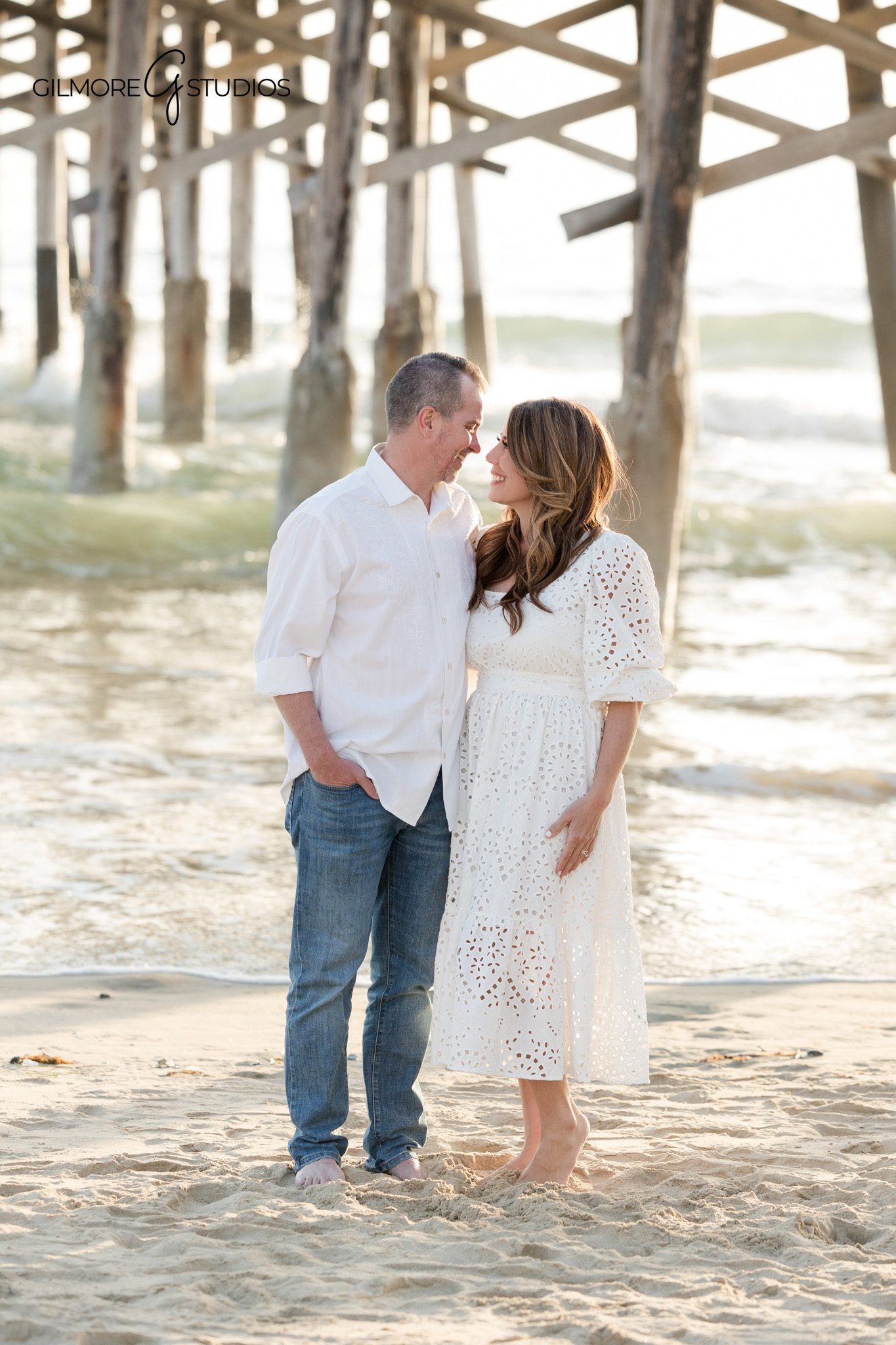 Family portrait photography at Newport Pier with natural expressions

Newport Beach family photographer photographing a multi generational family