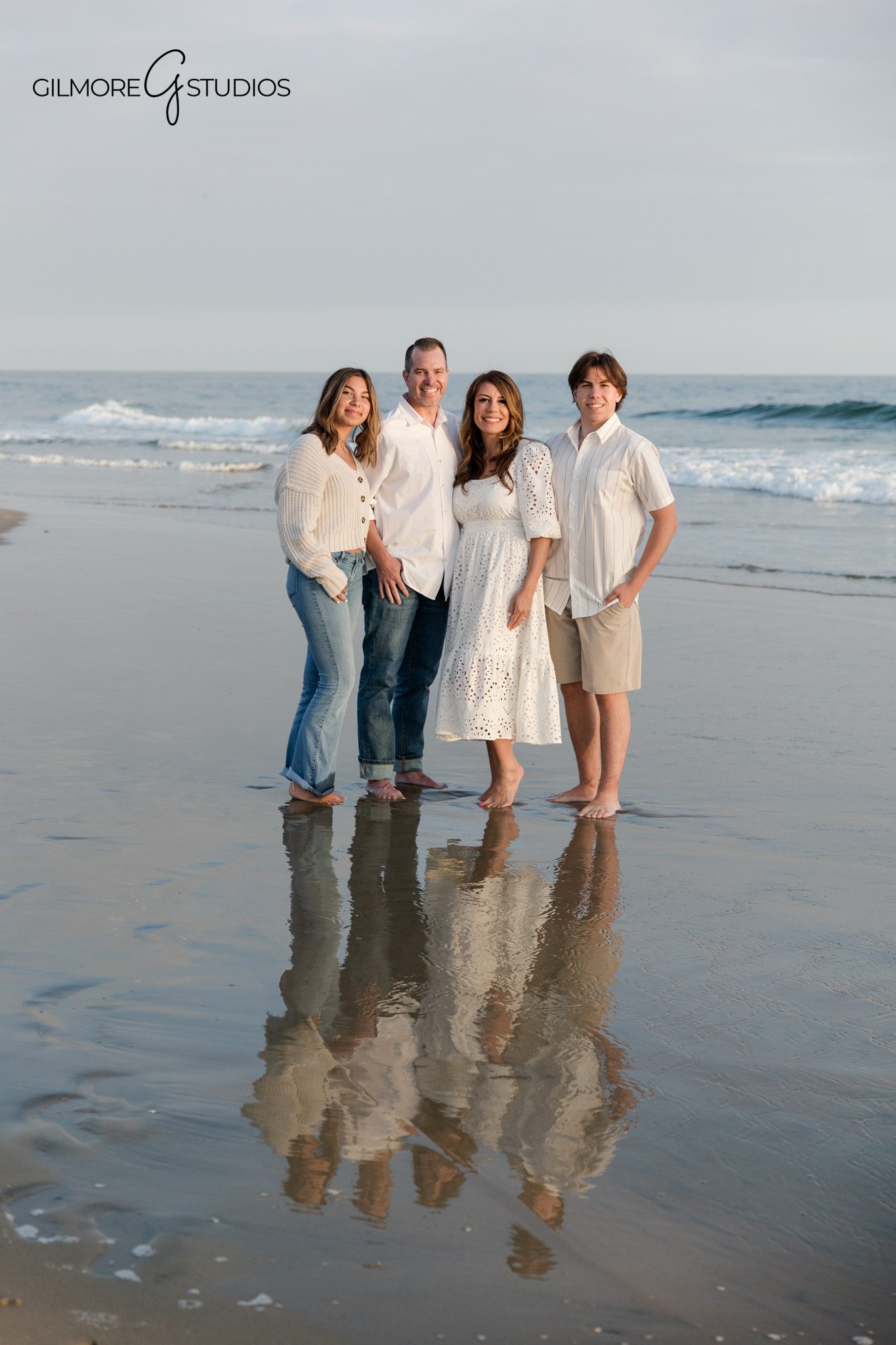 Newport Beach family photographer photographing candid moments at the pier

Coastal family photography session at Newport Pier California