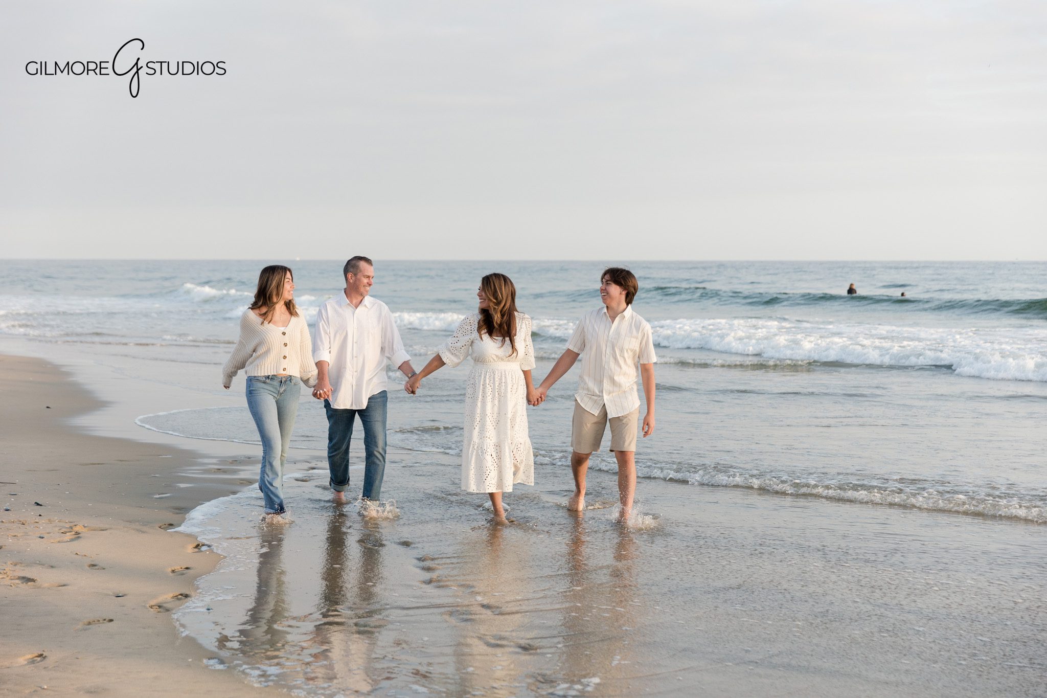Family photography at Newport Pier with soft coastal light

Newport Beach family portrait photography session at the beach pier