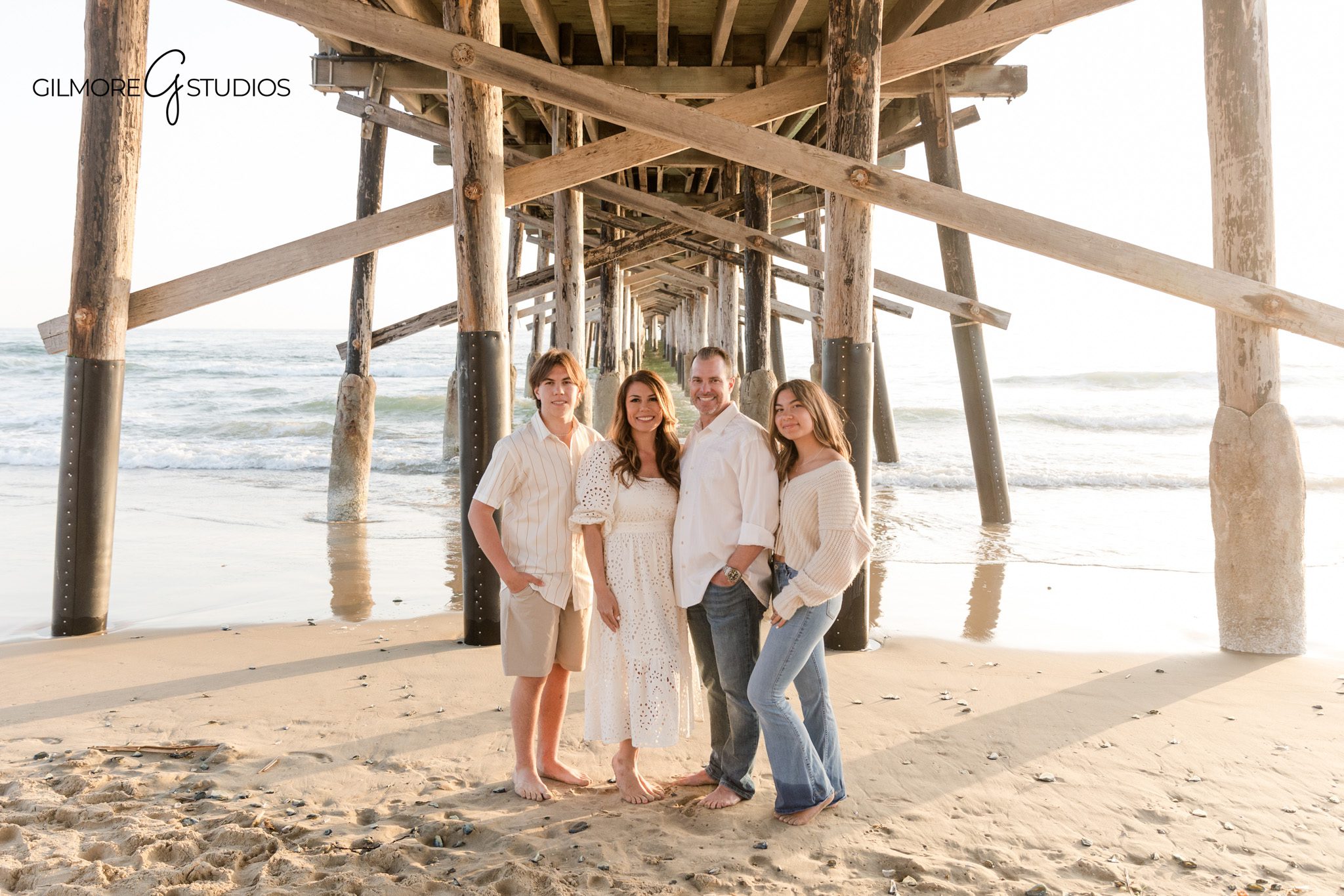 Newport Beach family photography session featuring natural connection at the pier

Family portrait photography captured at Newport Pier by a professional photographer