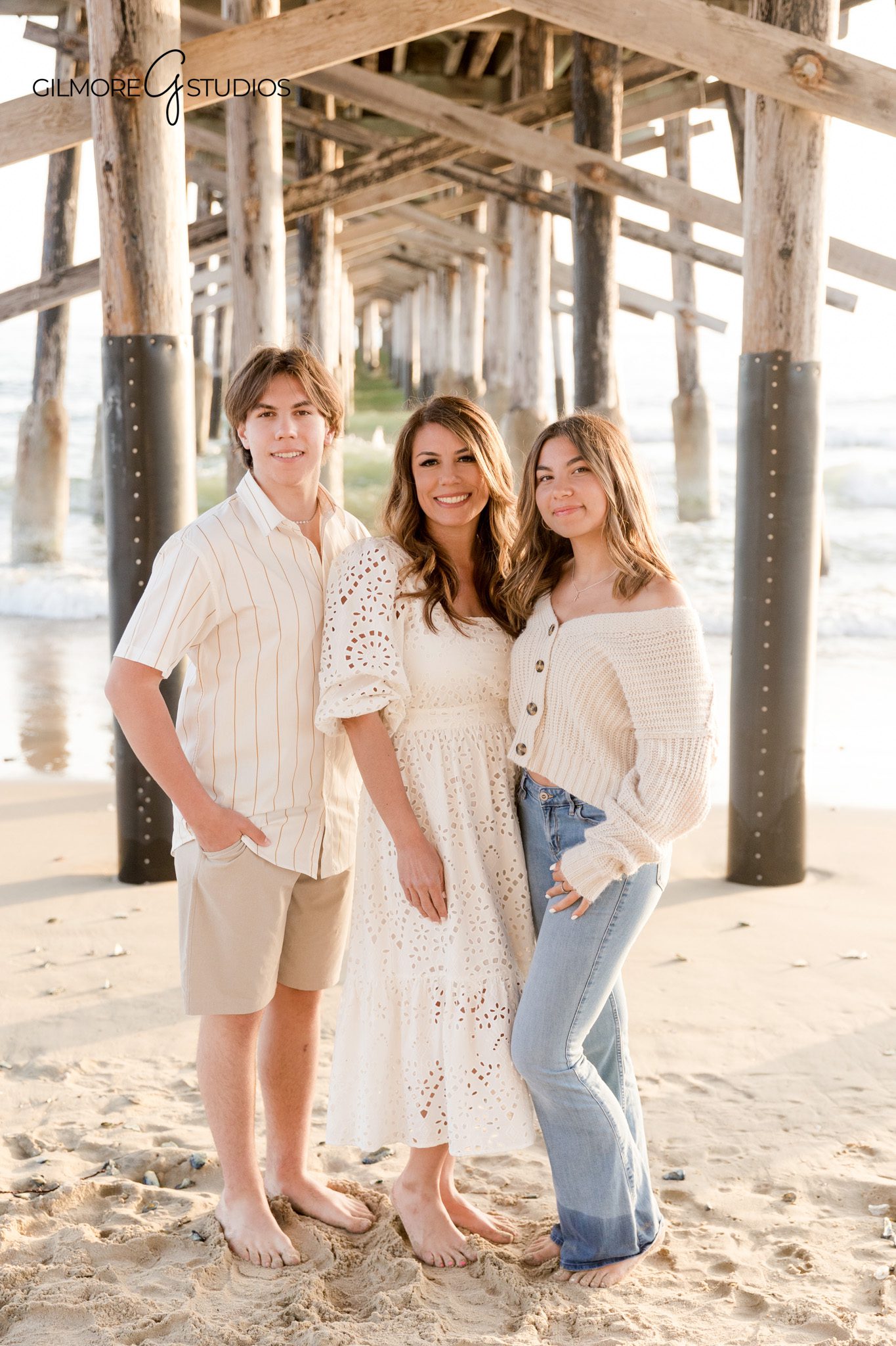 Newport Pier family portrait featuring parents and children photographed naturally

Newport Beach family photographer capturing a relaxed pier photo session