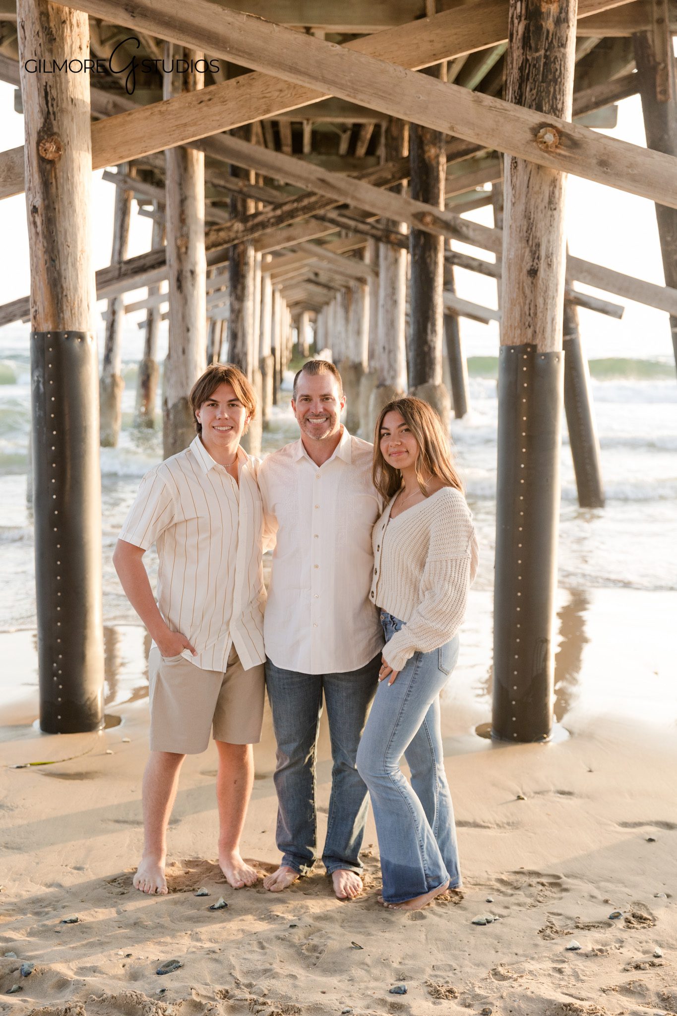 Pier family portrait photography photographed by Gilmore Studios

Newport Beach family photography highlighting connection and emotion