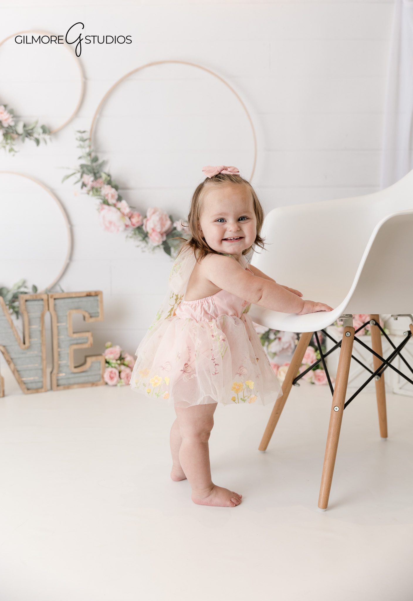 Cake smash studio photography with clean neutral styling

Baby milestone portrait photographed by an Orange County photographer
