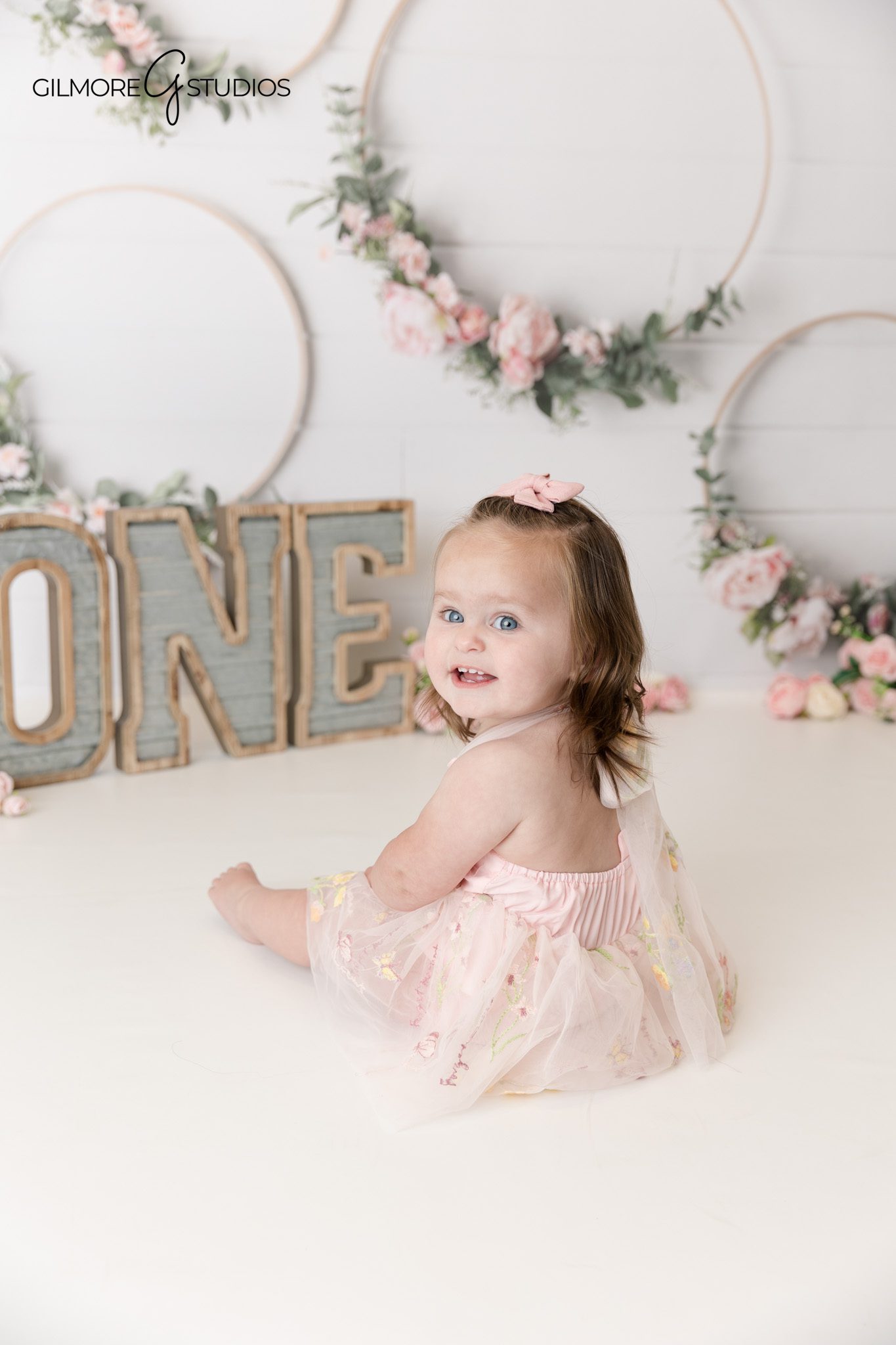 Professional cake smash portrait captured with clean studio lighting

Baby portrait photography documenting a first birthday milestone