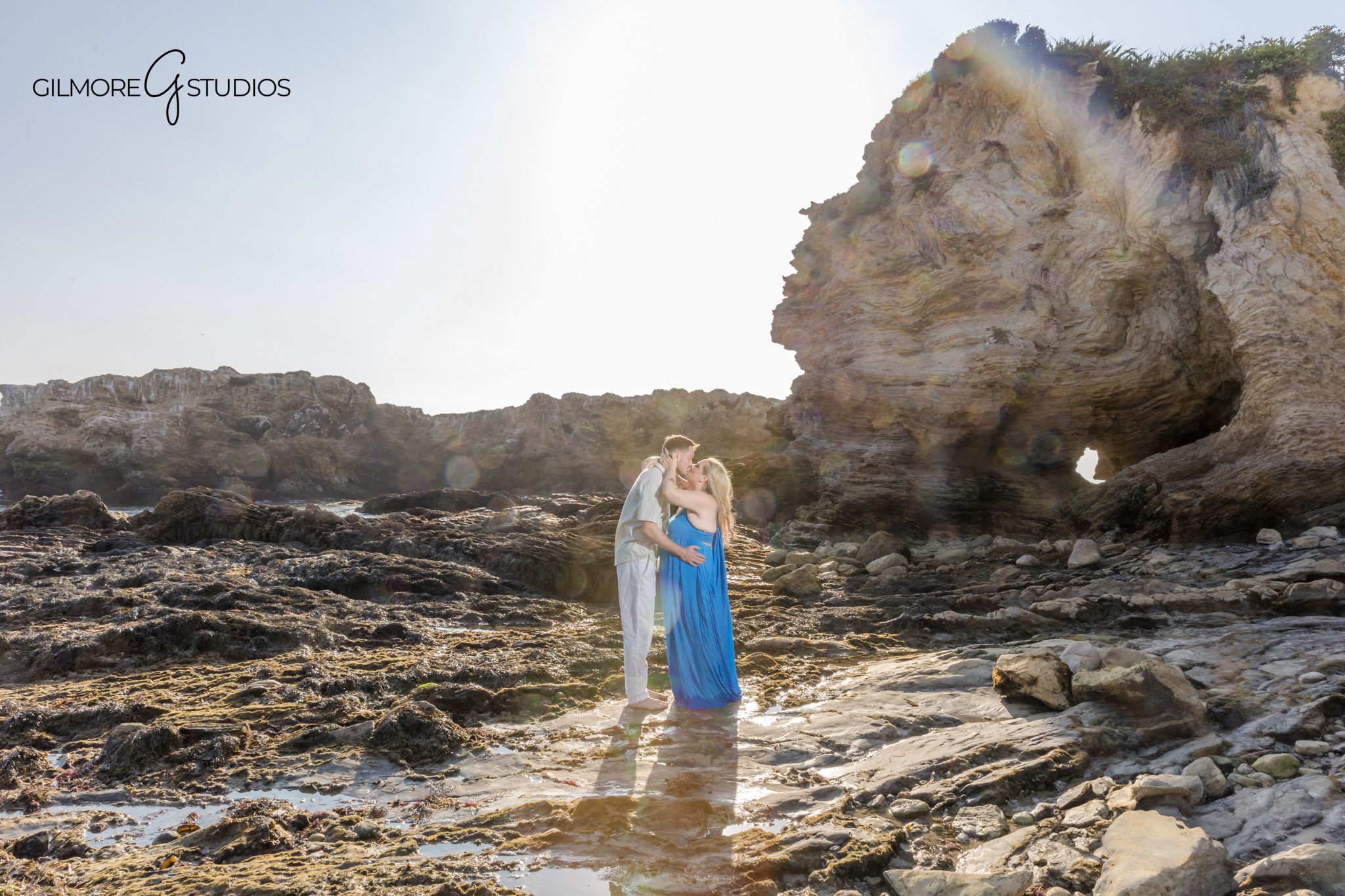 Engagement photographer capturing couple walking along Corona del Mar beach.

Family photography session at Corona del Mar with Gilmore Studios.