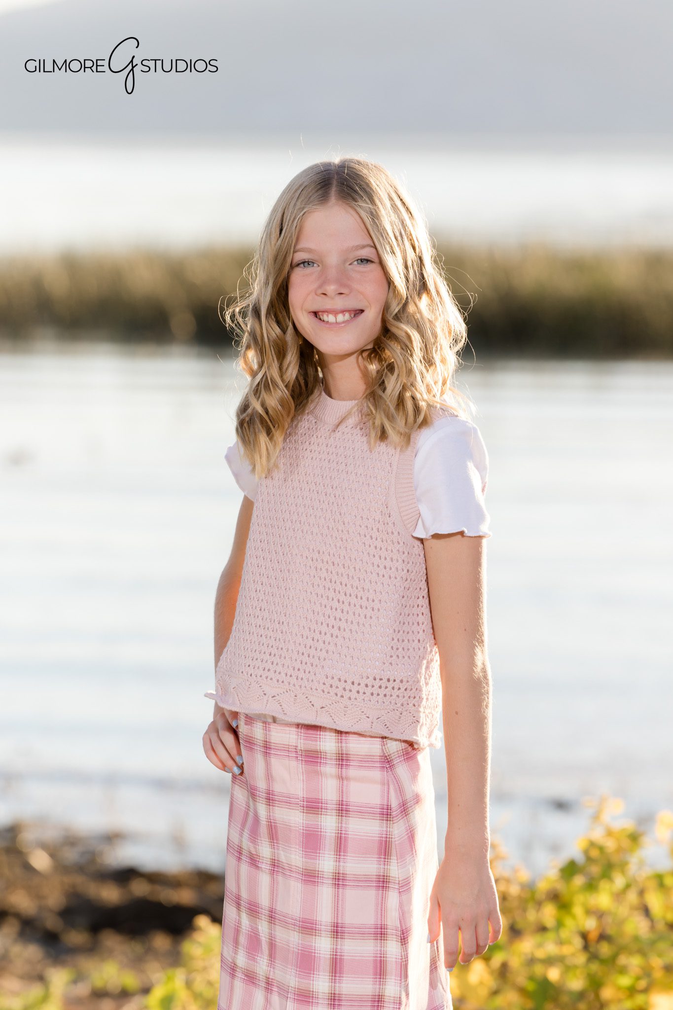 Utah photographer capturing joyful family moment with kids.

Natural family portrait photography with mountain background.
