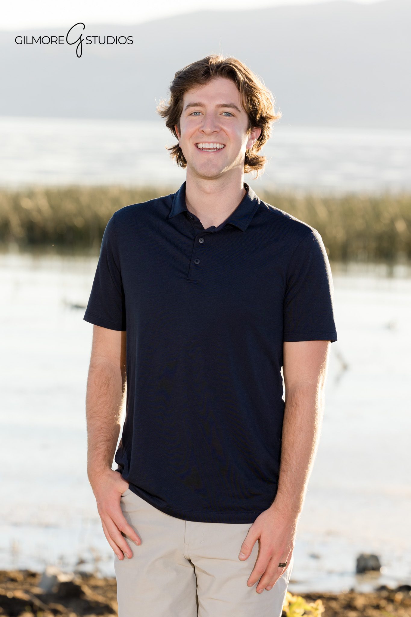 Portrait photographer capturing family in simple neutral outfits.

Natural light photography with Utah mountains in background.