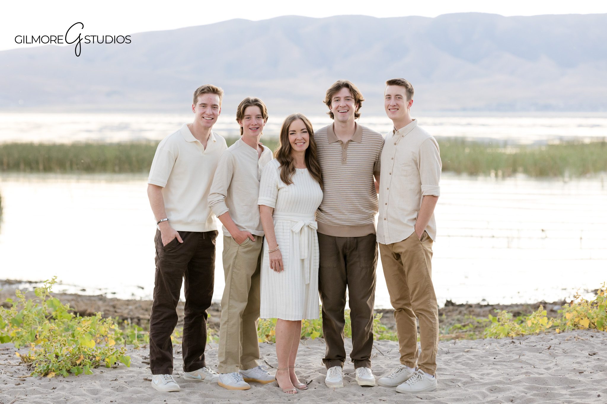 Utah lifestyle photographer documenting natural family scene.

Gilmore Studios capturing heartfelt mother and kids portrait.