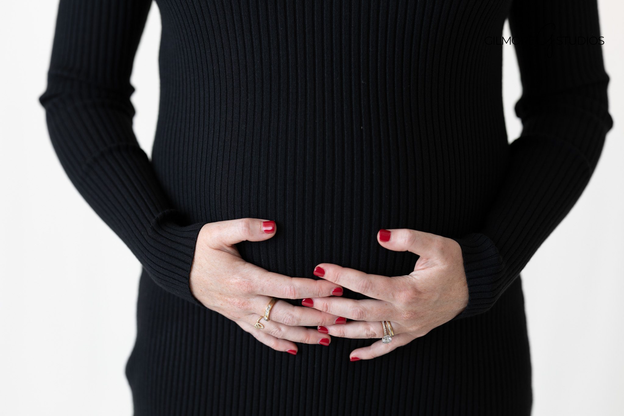 motherhood silhouette photo in black and white studio setting

maternity photographer capturing elegant studio portrait