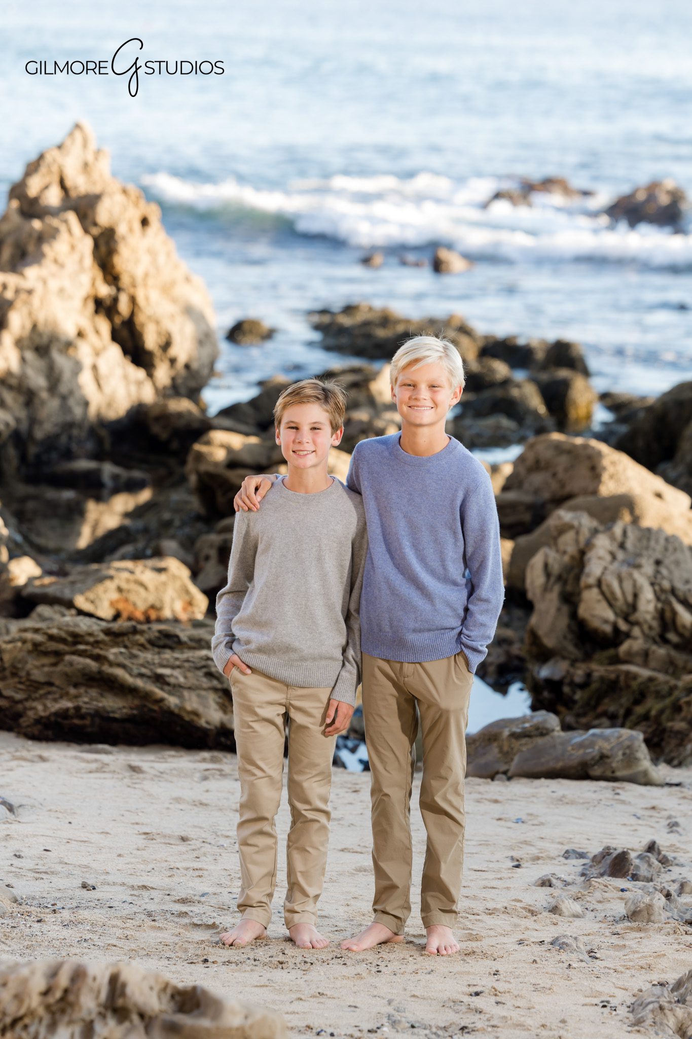 Family photography of siblings playing at Little Corona in Newport Beach.

Outdoor portrait photographer capturing relaxed family beach moments.
