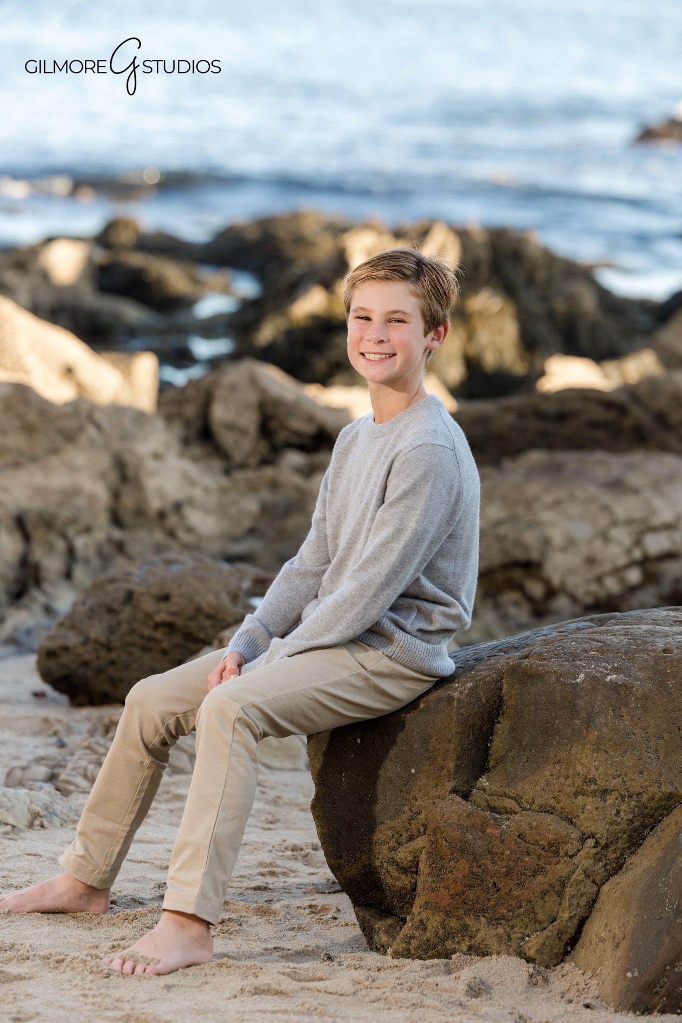 Newport Beach photographer capturing candid family interactions at CDM.

Little Corona reef and rocks featured in family portrait photography.