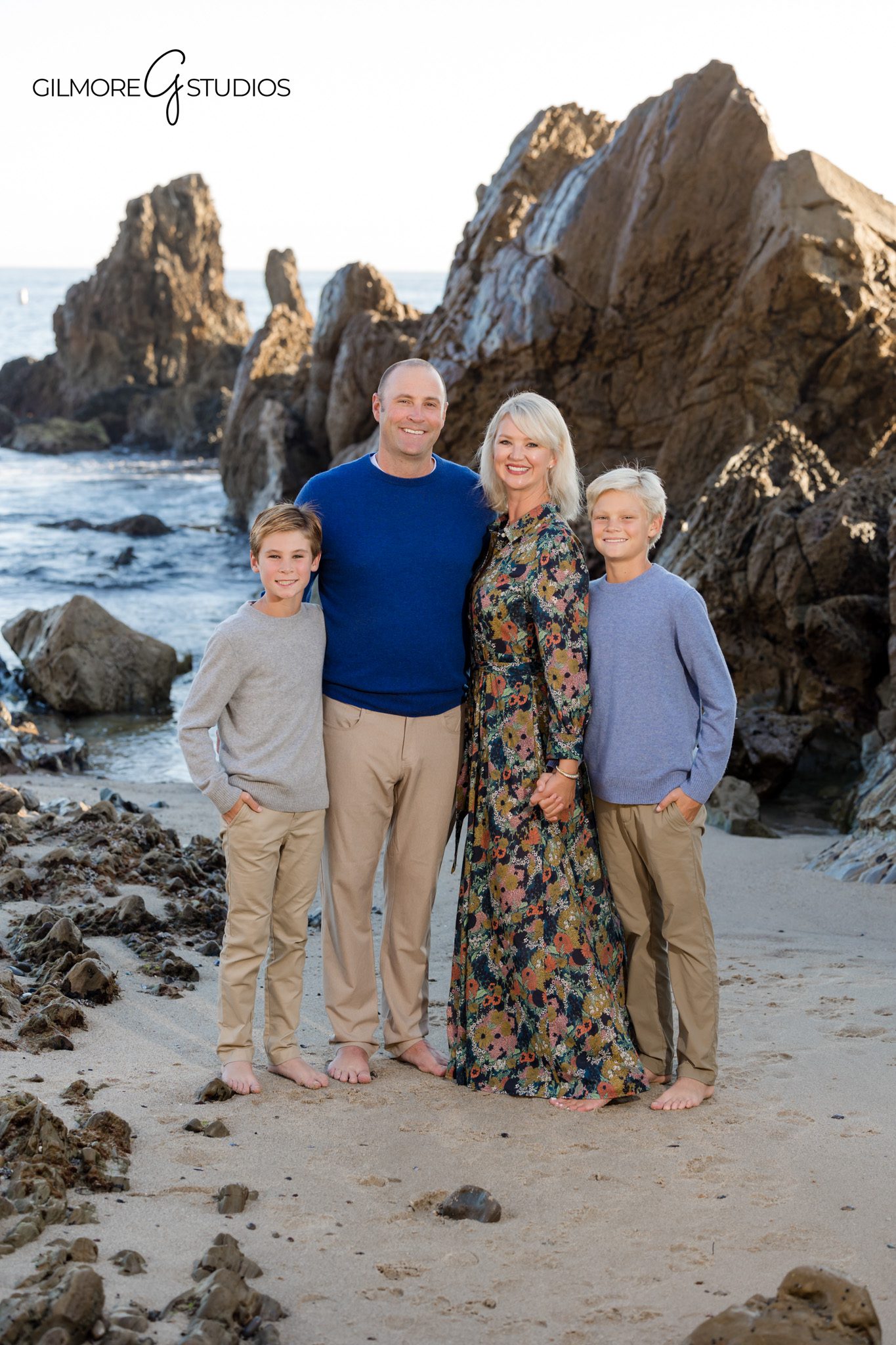 Little Corona family photography session with natural coastal light.

Newport Beach photographer capturing candid family portraits on the sand.