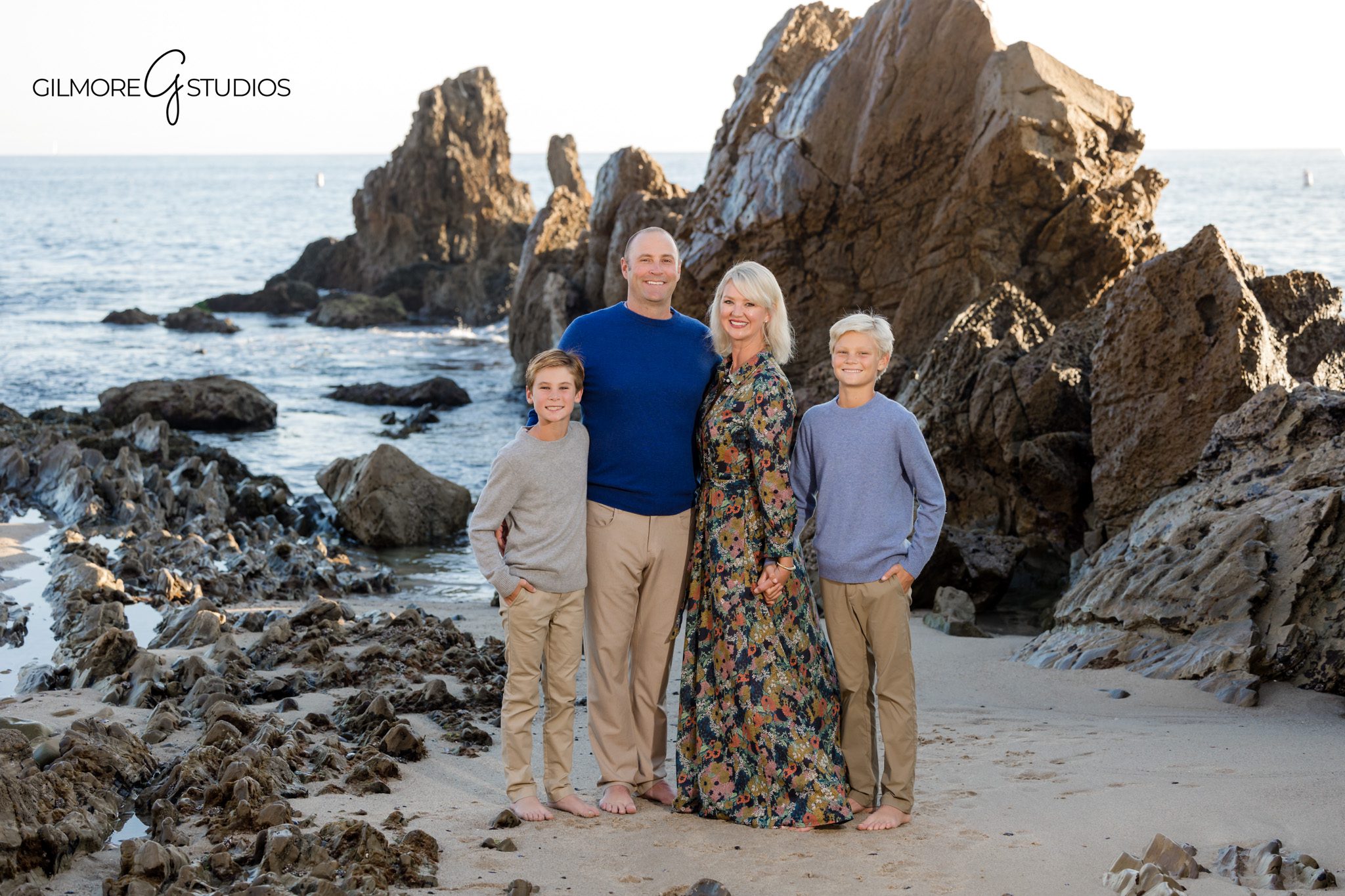 Newport Beach photographer documenting fun family shoreline moments.

Orange County family portrait photography during sunset at CDM.