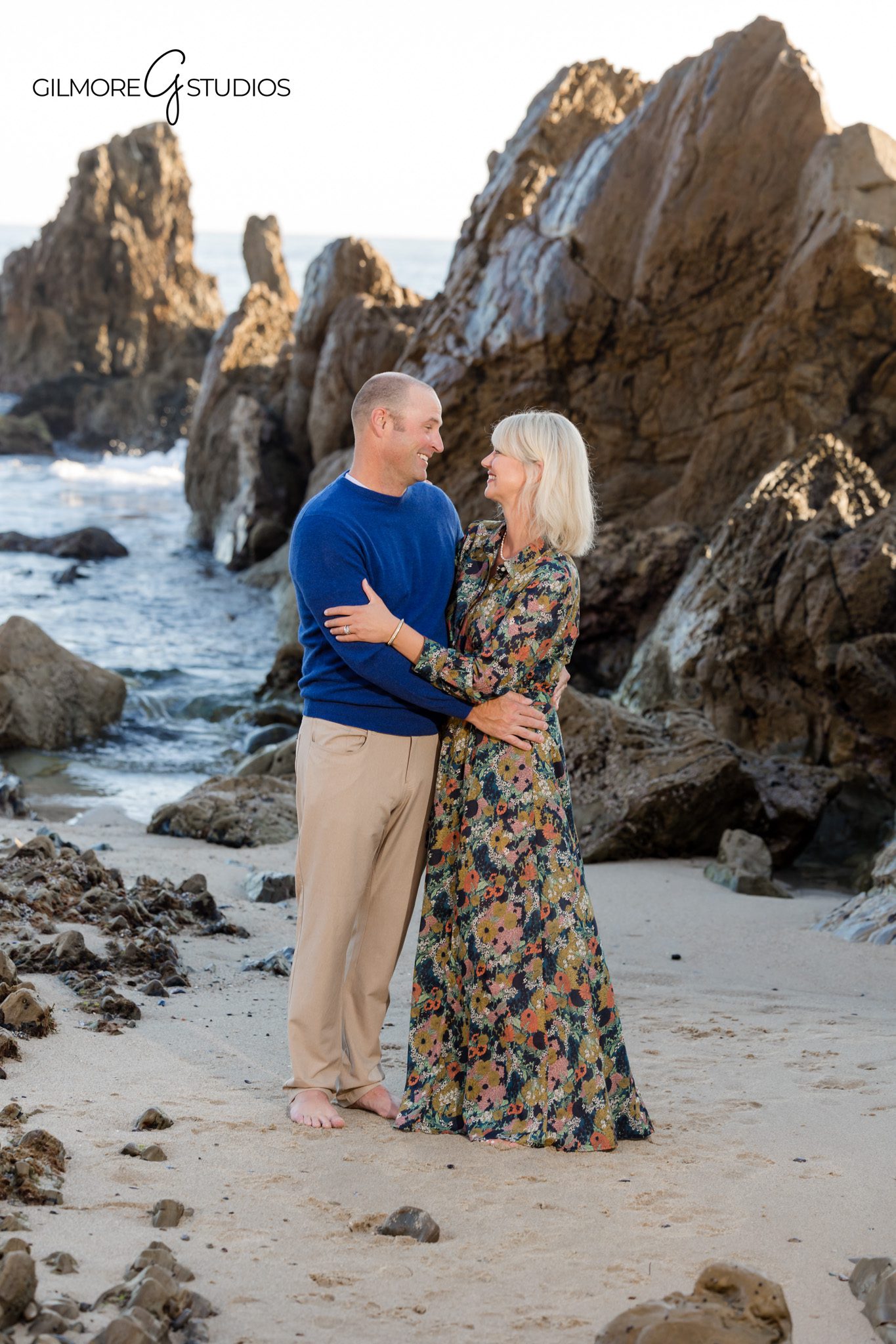 Coastal family session portrait with Gilmore Studios at CDM.

Photographer capturing kids exploring tide pools at Little Corona.