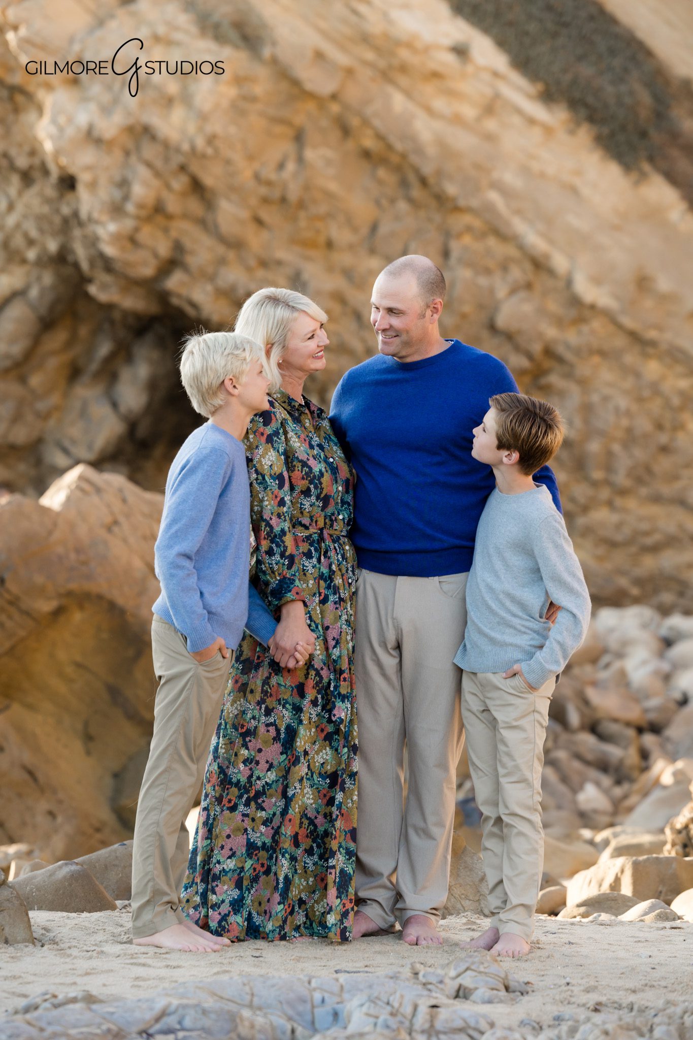 Coastal family photography at Little Corona tide pools in Orange County.

Photographer capturing parents walking with kids at Little Corona CDM.