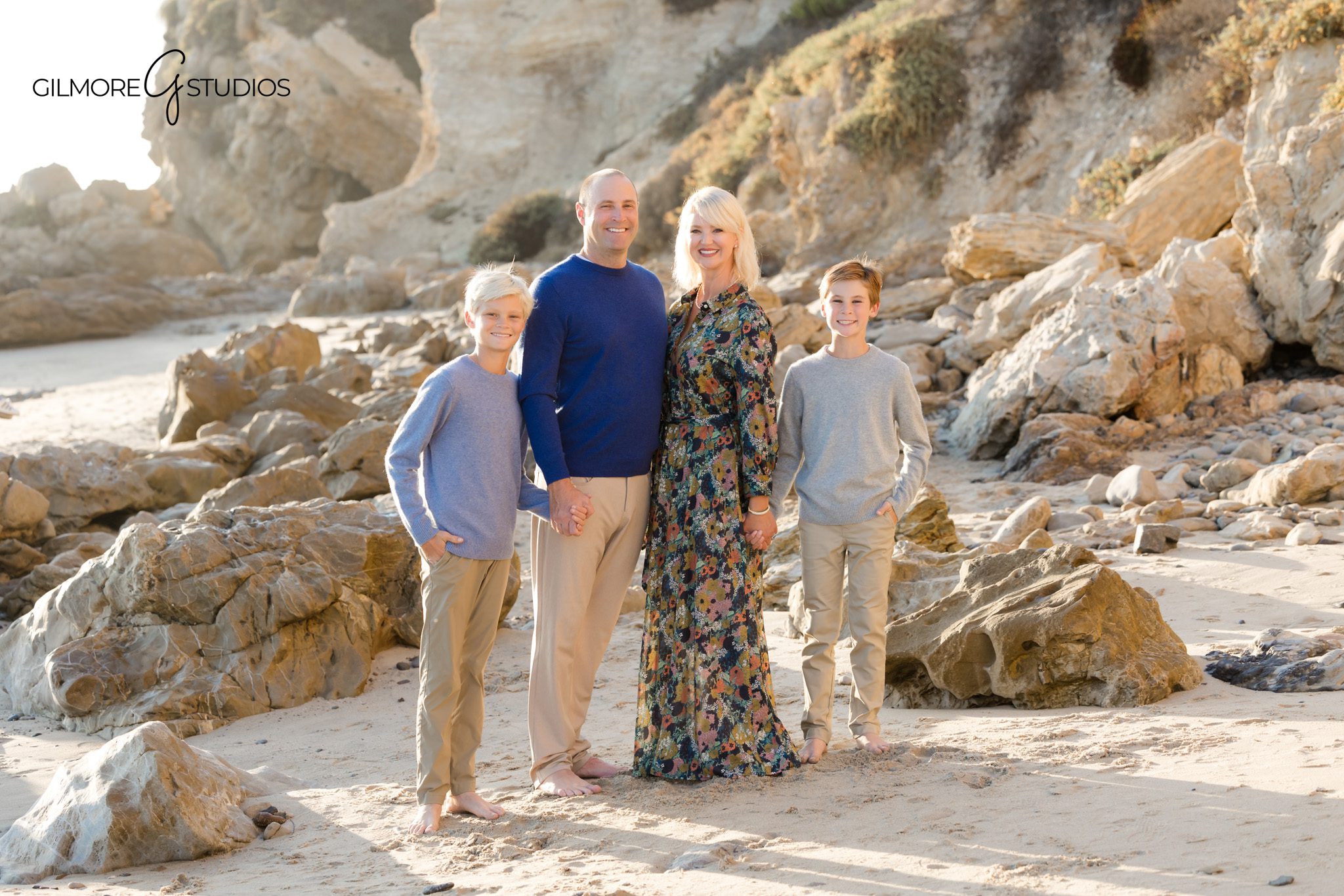Newport Beach portrait photographer capturing soft and airy beach tones.

Family photography with natural waves behind Little Corona cliffs.