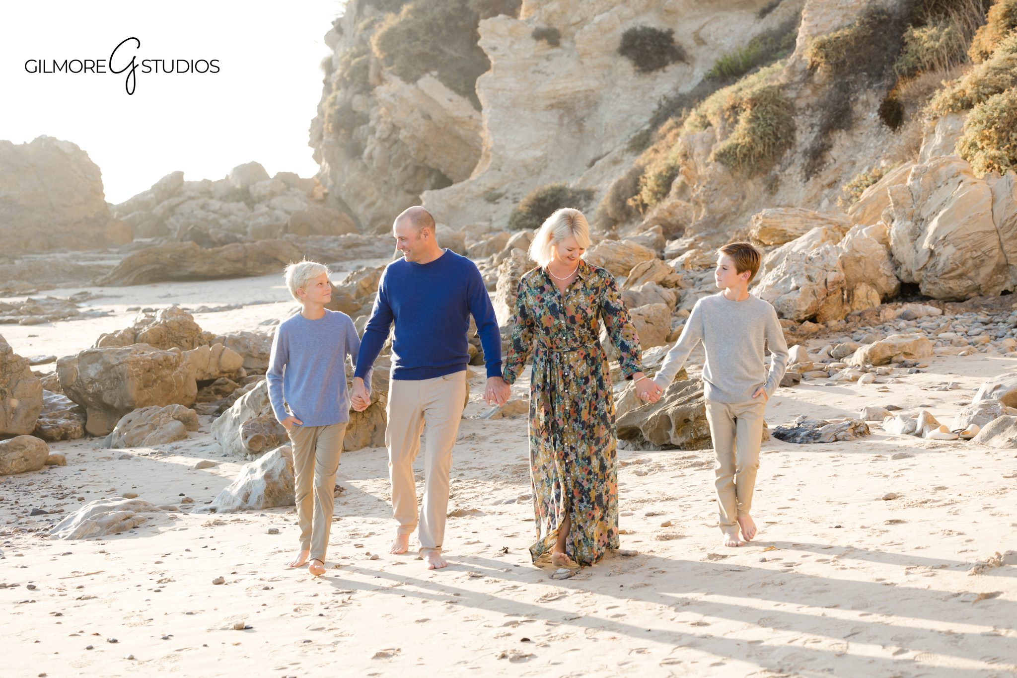 Little Corona family portraits captured in warm natural light.

Photographer capturing movement and joy in family beach session.