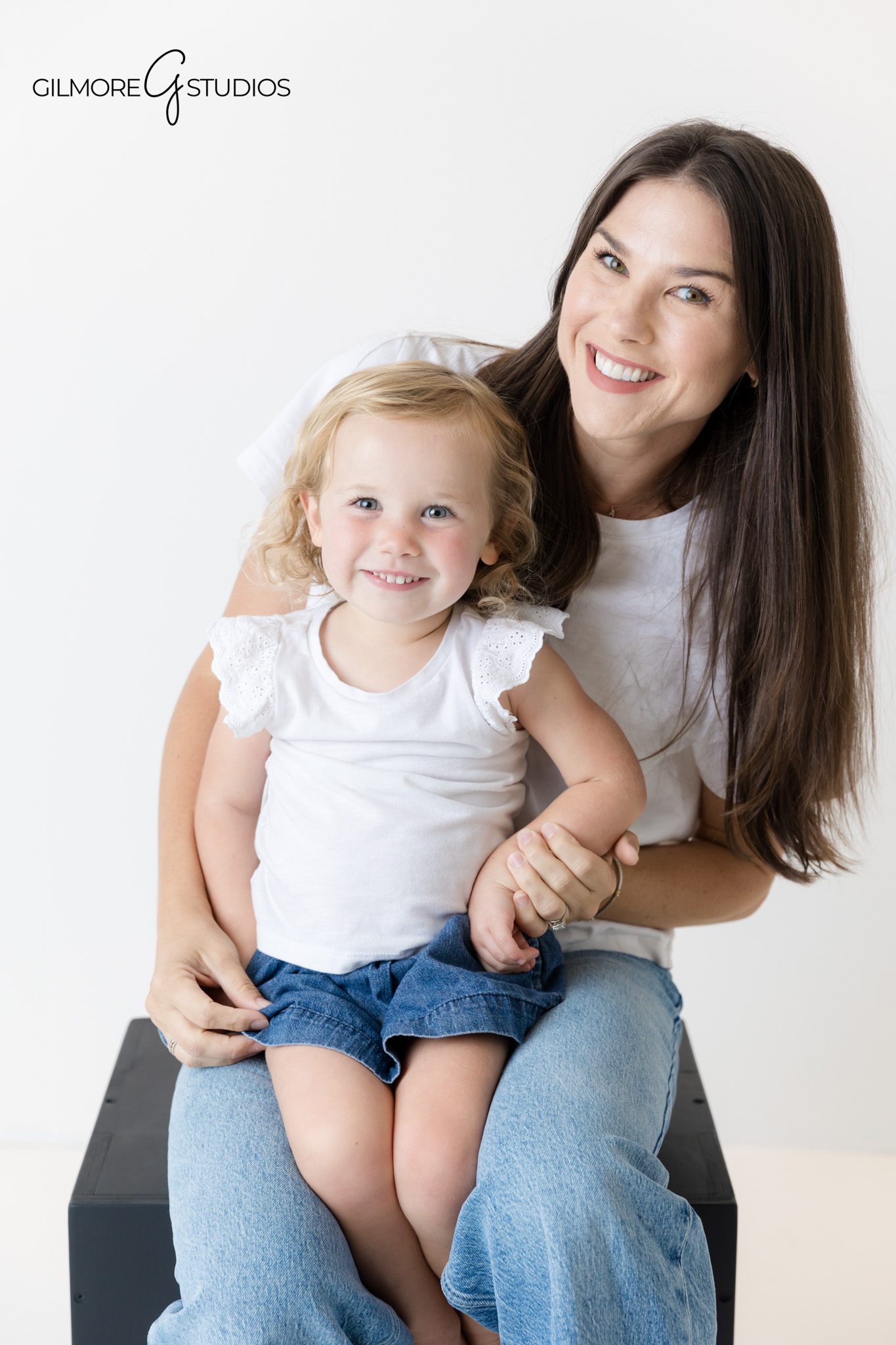 Family photography with crisp white background and matching outfits.

Studio photographer capturing joyful family interactions in minimal wardrobe.