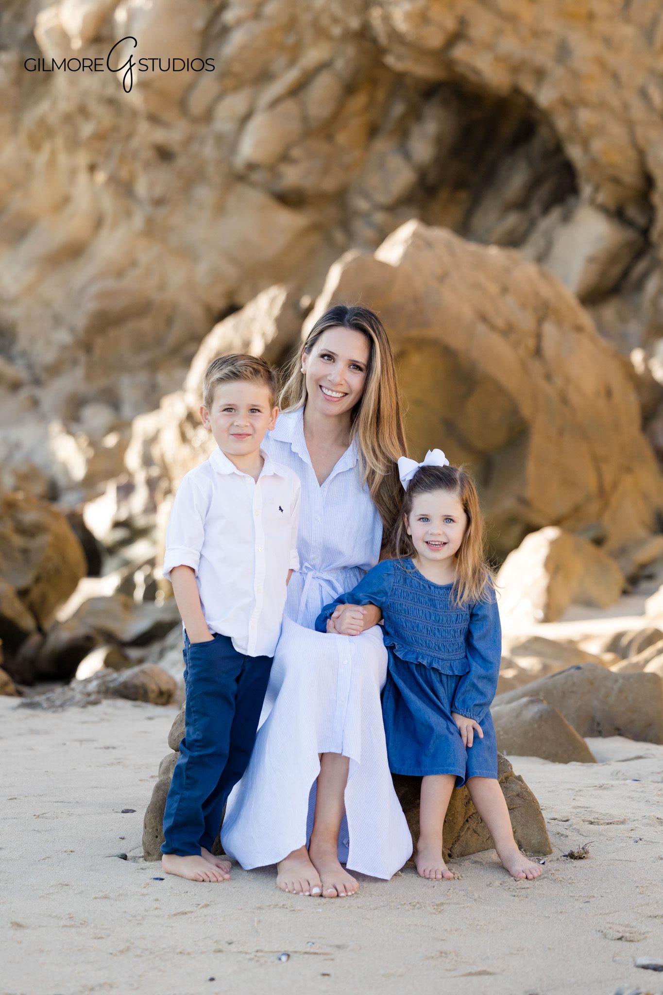 Gilmore Studios family photography capturing playful beach moments.

Newport Beach photographer documenting family exploring tide pools.