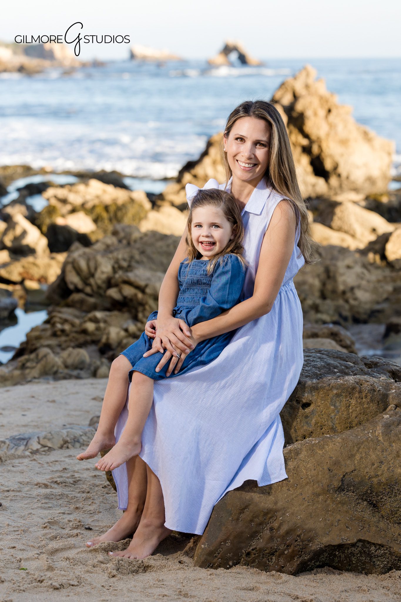 Little Corona family photography showing joyful movement.

Family portrait photographer capturing serene coastal moment.