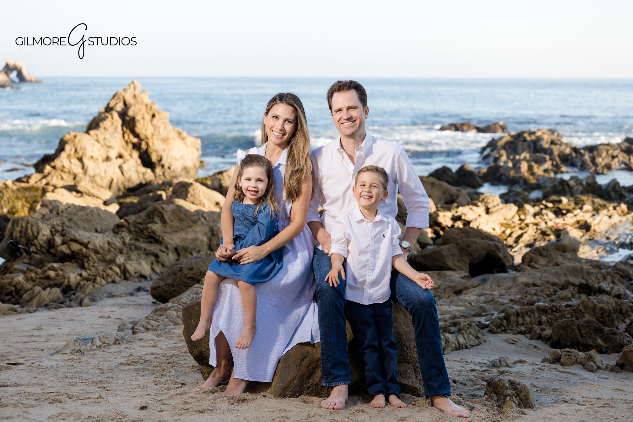 Corona del Mar portrait photographer capturing golden hour family images.

Little Corona family portraits with scenic Southern California coastline.