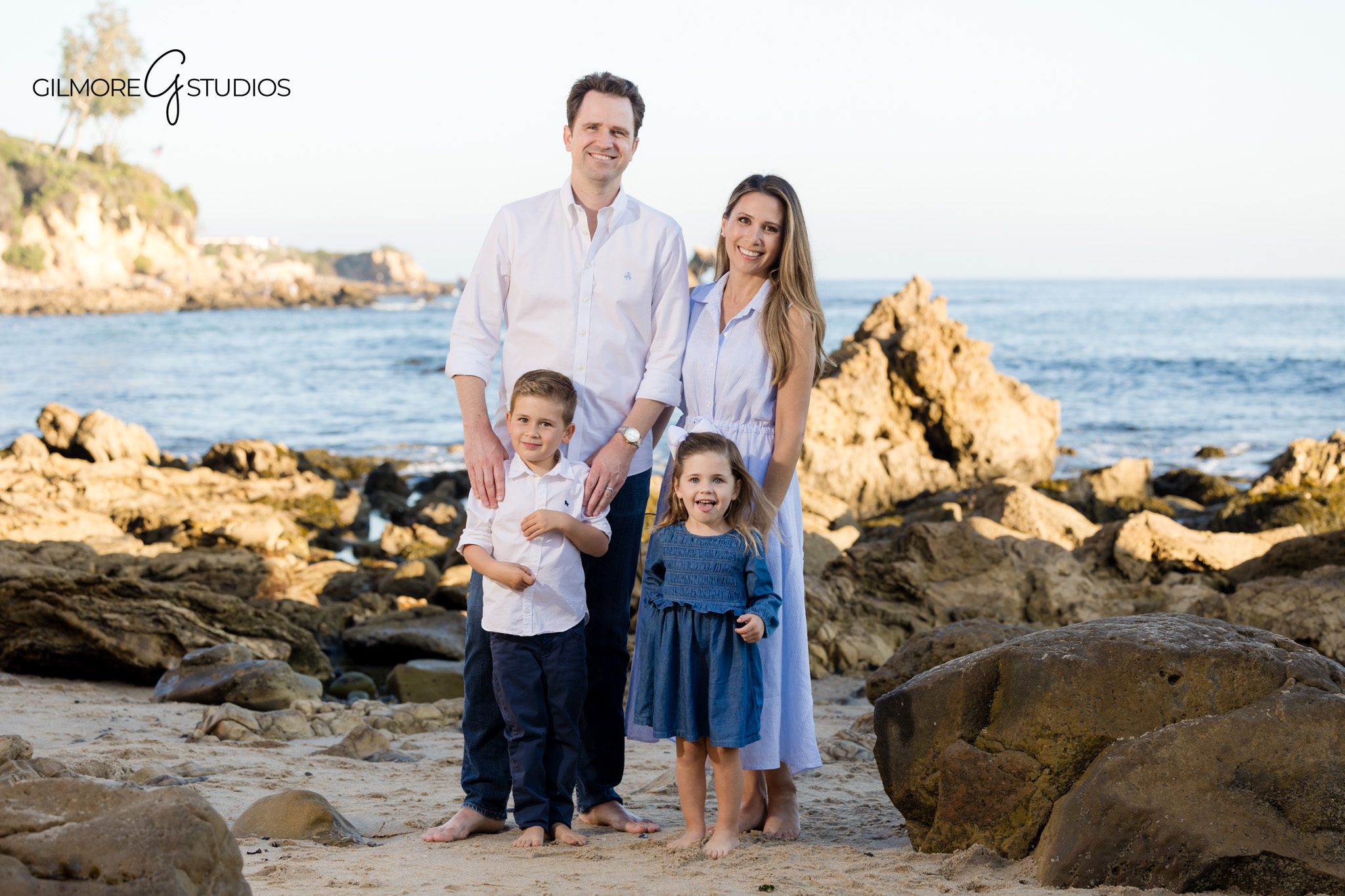 Gilmore Studios family sessions at Corona del Mar during sunset.

Family photographer capturing connection and emotion by the water.