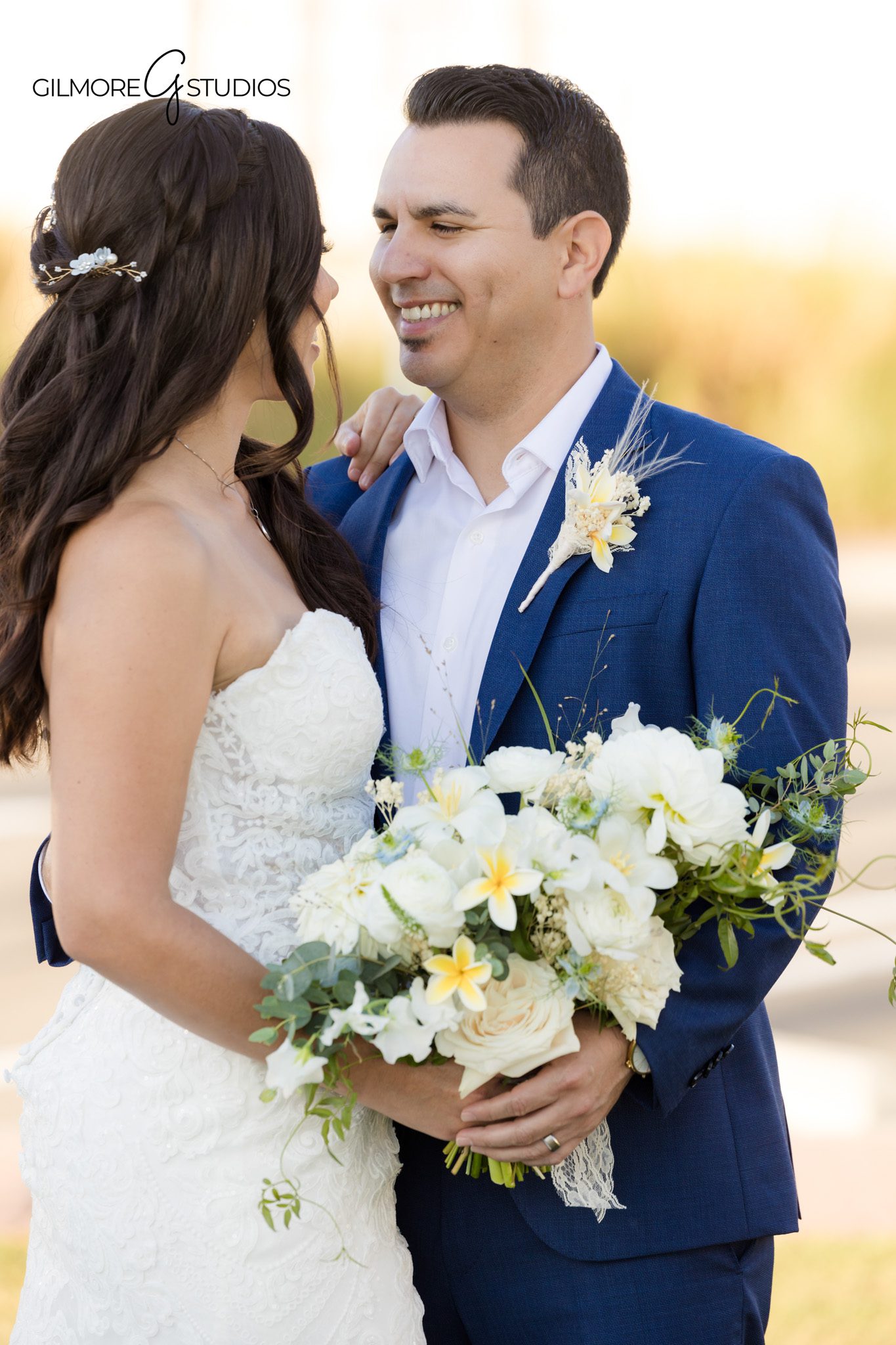 San Clemente beach bridal portrait with bride and groom walking along shore

Coastal bridal photography session photographed in San Clemente California