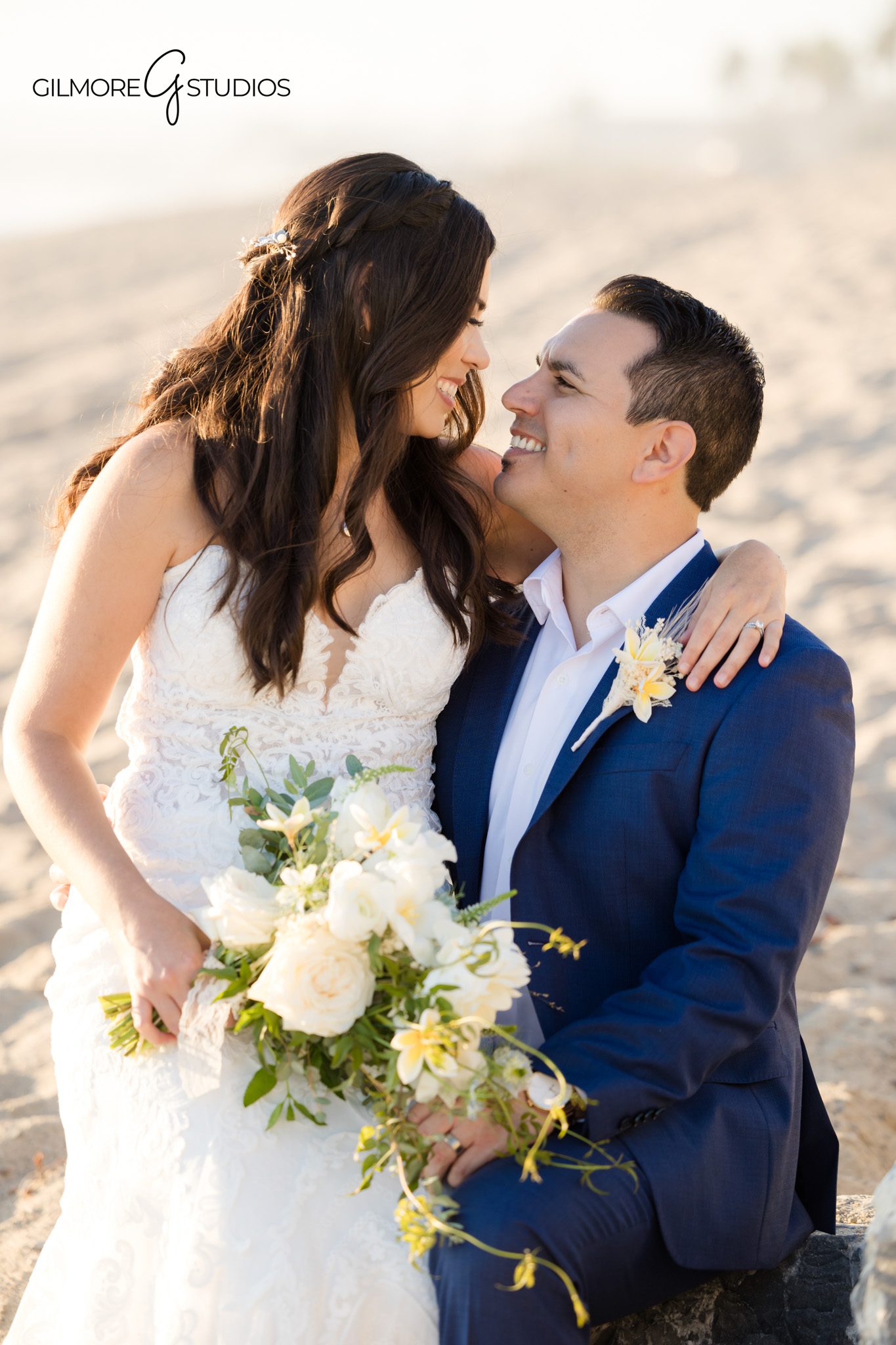 San Clemente coastal bridal photography featuring bride and groom portraits

Beach bridal session in San Clemente photographed by a luxury wedding photographer