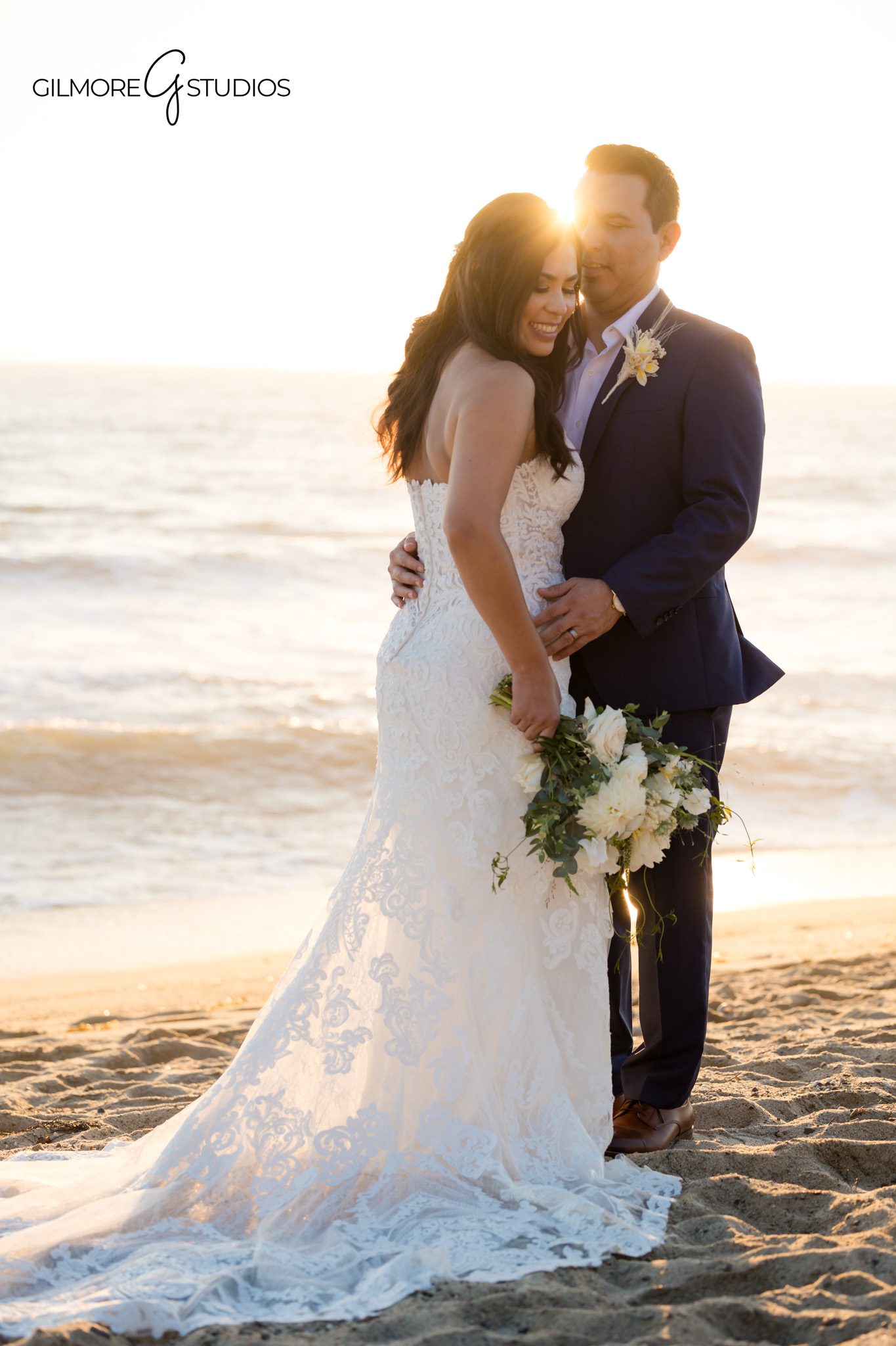 Bride and groom portrait photography with San Clemente beach backdrop

San Clemente wedding photographer documenting a beach bridal session