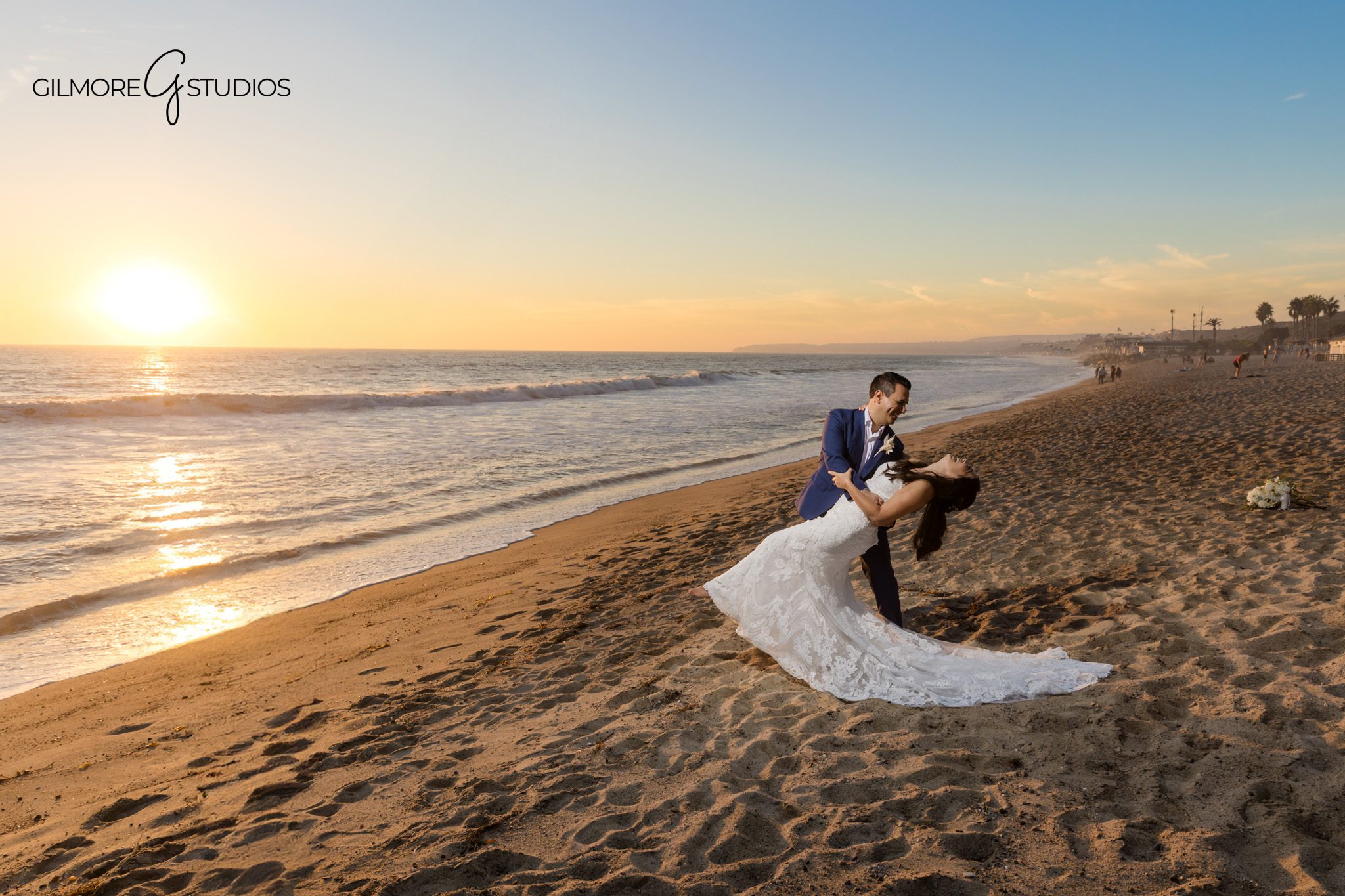 San Clemente beach bridal portrait photography with timeless editing

Bride and groom photography session captured at San Clemente coastline