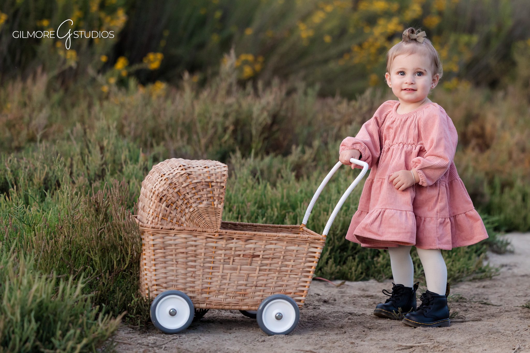 Photographer capturing coordinated family outfits at Newport Back Bay.

Back Bay extended family photography with golden sunset lighting.